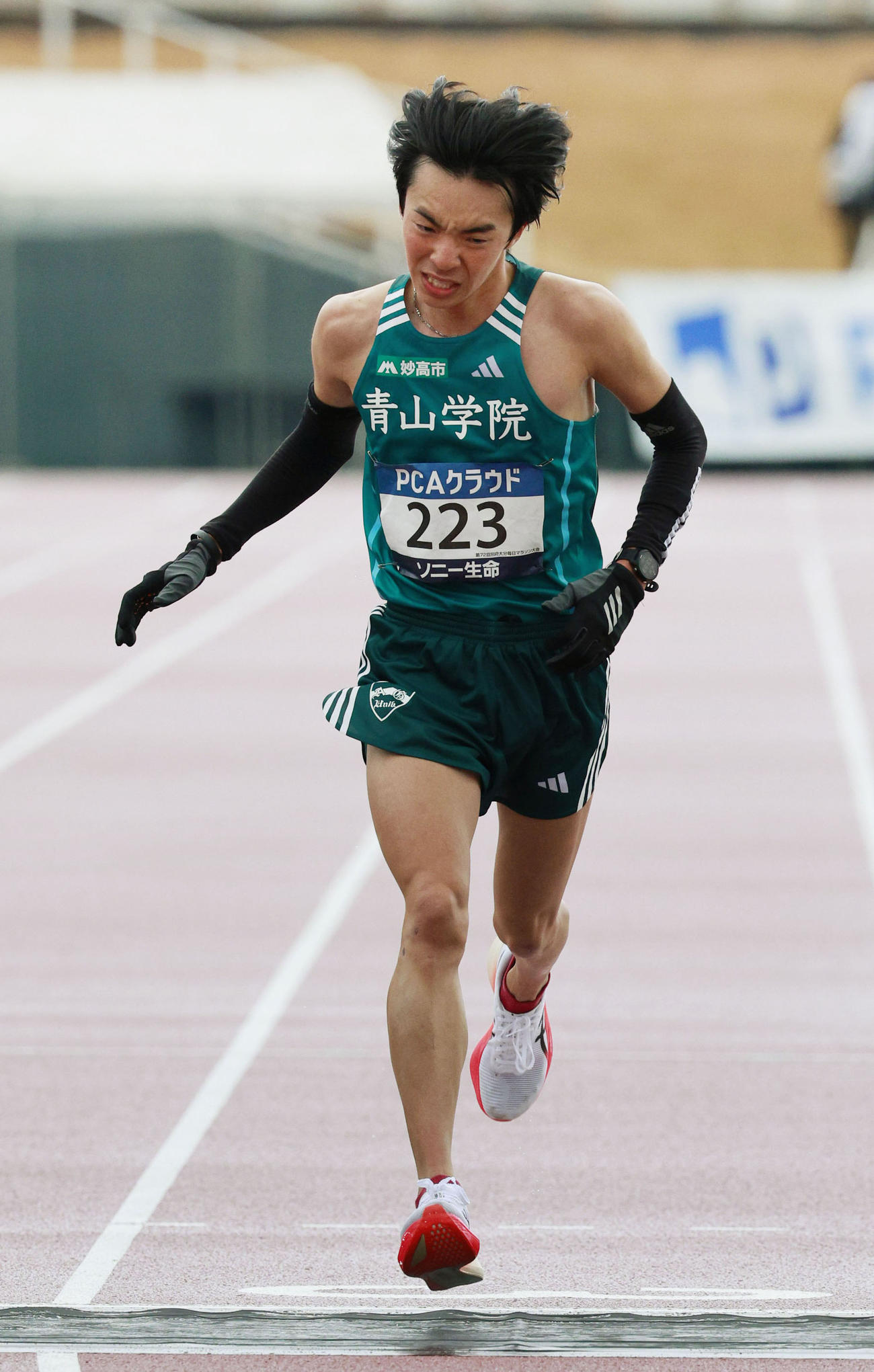 14位でゴールする倉本玄太（共同）