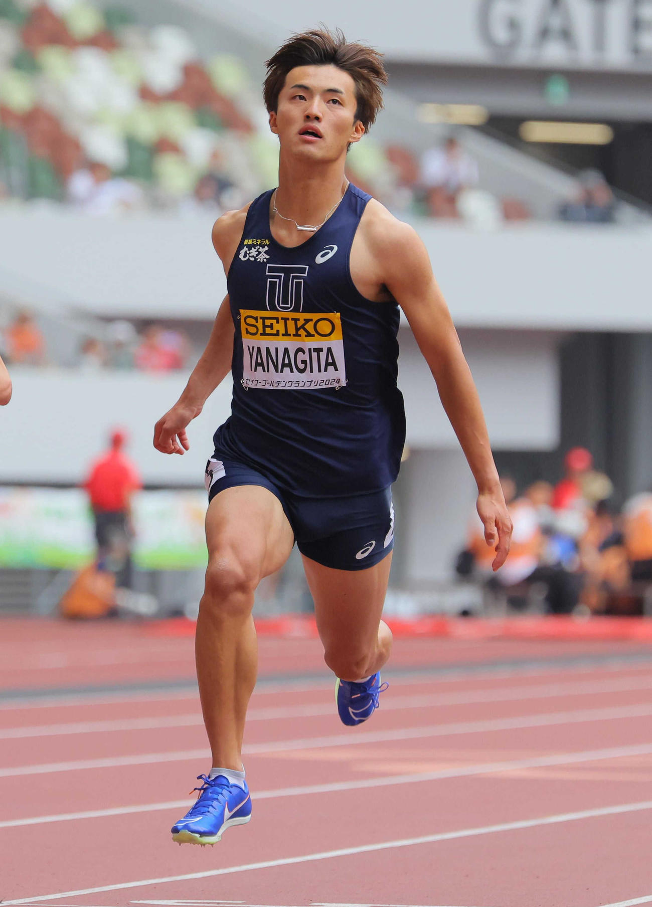 男子100メートル予選　ゴールする柳田（代表撮影）