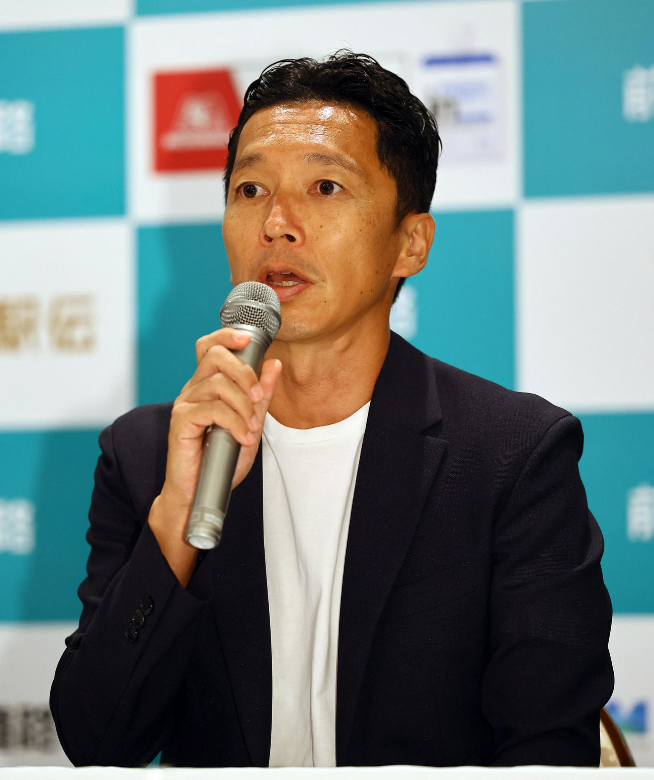 記者会見する中大・藤原監督（撮影・藤尾明華）