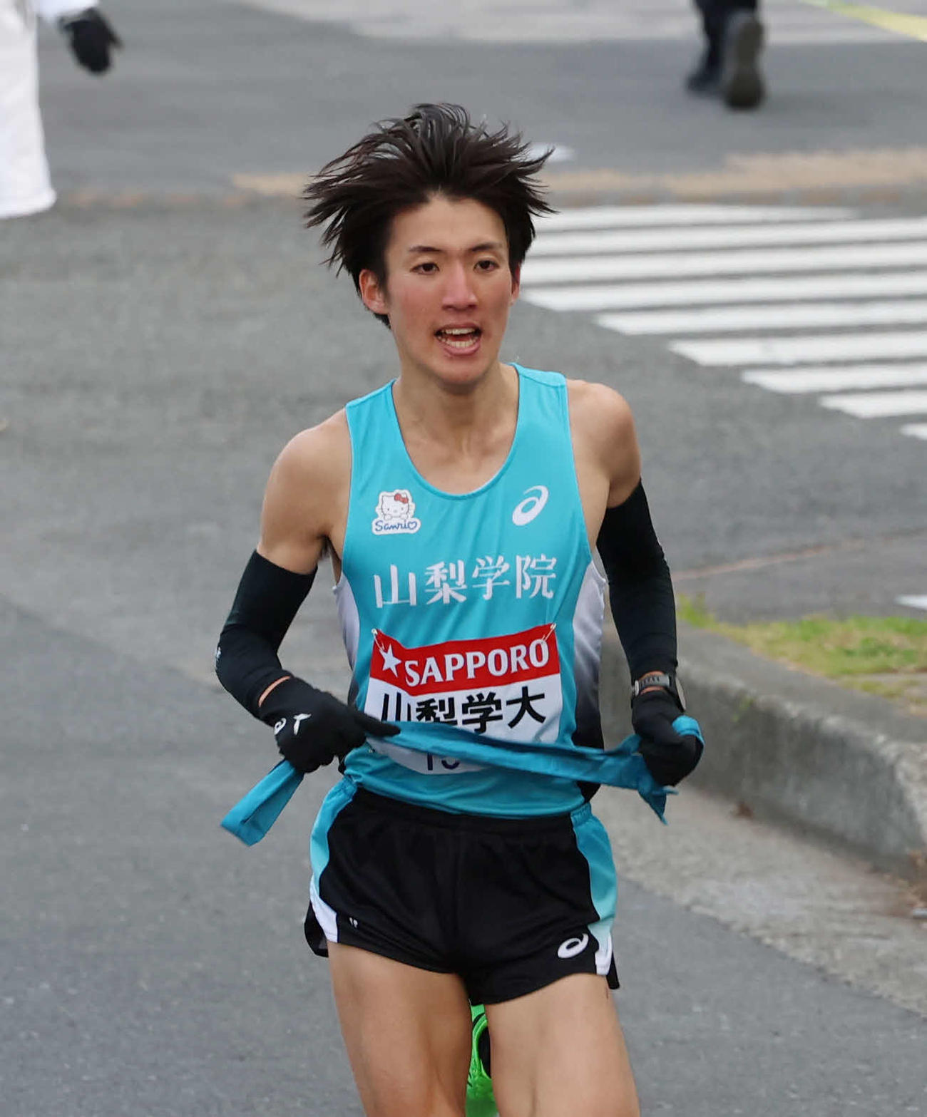 鶴見中継所で力走する山梨学院大・平八重（撮影・増田悦実）