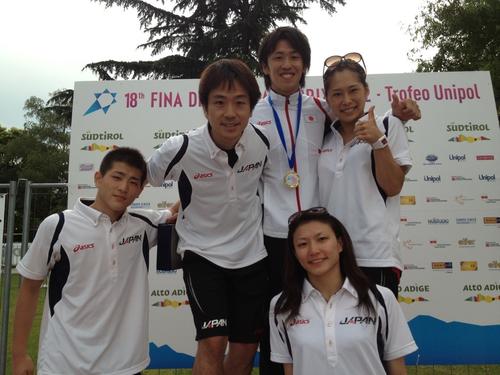 2012年イタリアGP　左から3人目が坂井、4人目が筆者