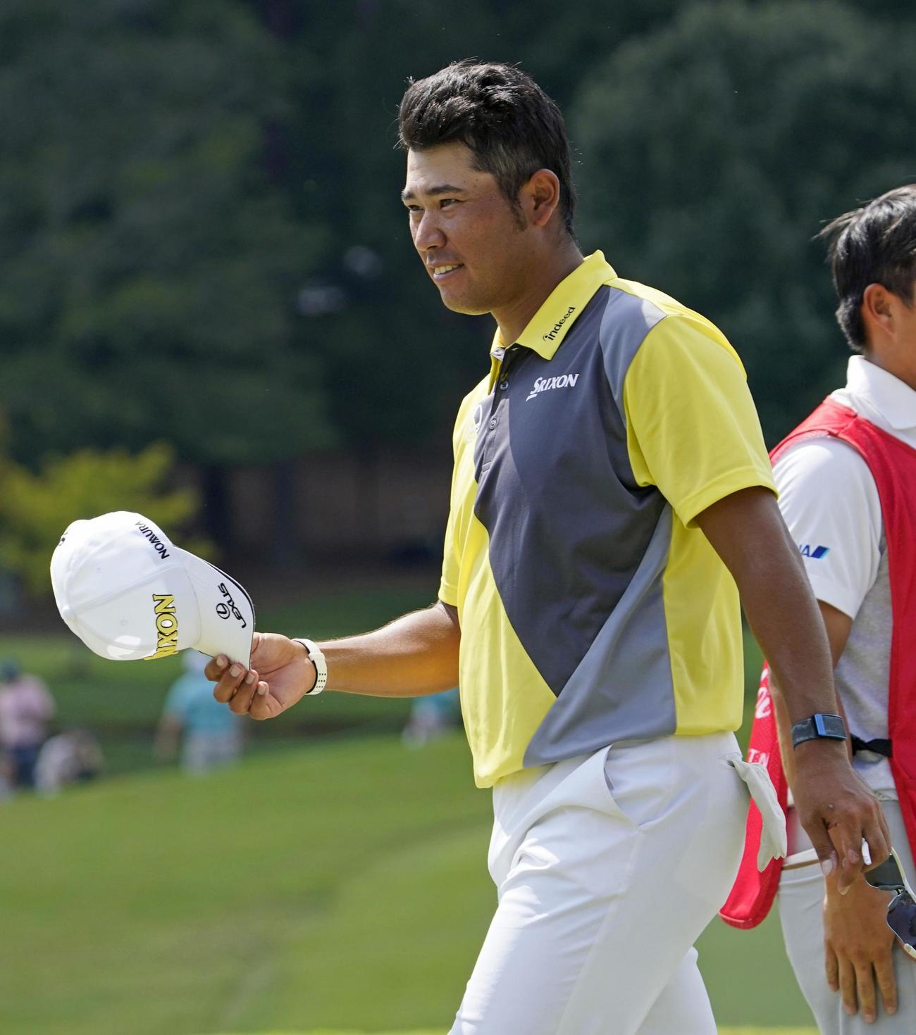 最終ラウンド、ホールアウトする松山英樹（共同）