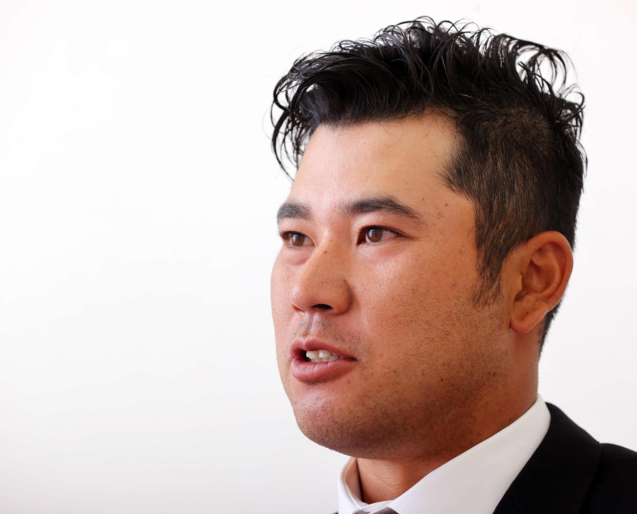 1年を振り返り、今後についての思いを語った松山（撮影・浅見桂子）