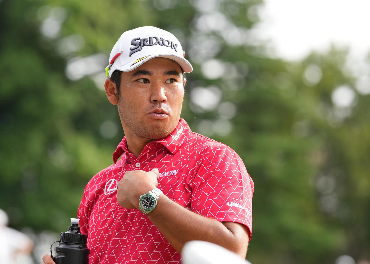 練習日ラウンドを終えリラックスした表情を見せる松山（撮影・垰建太）