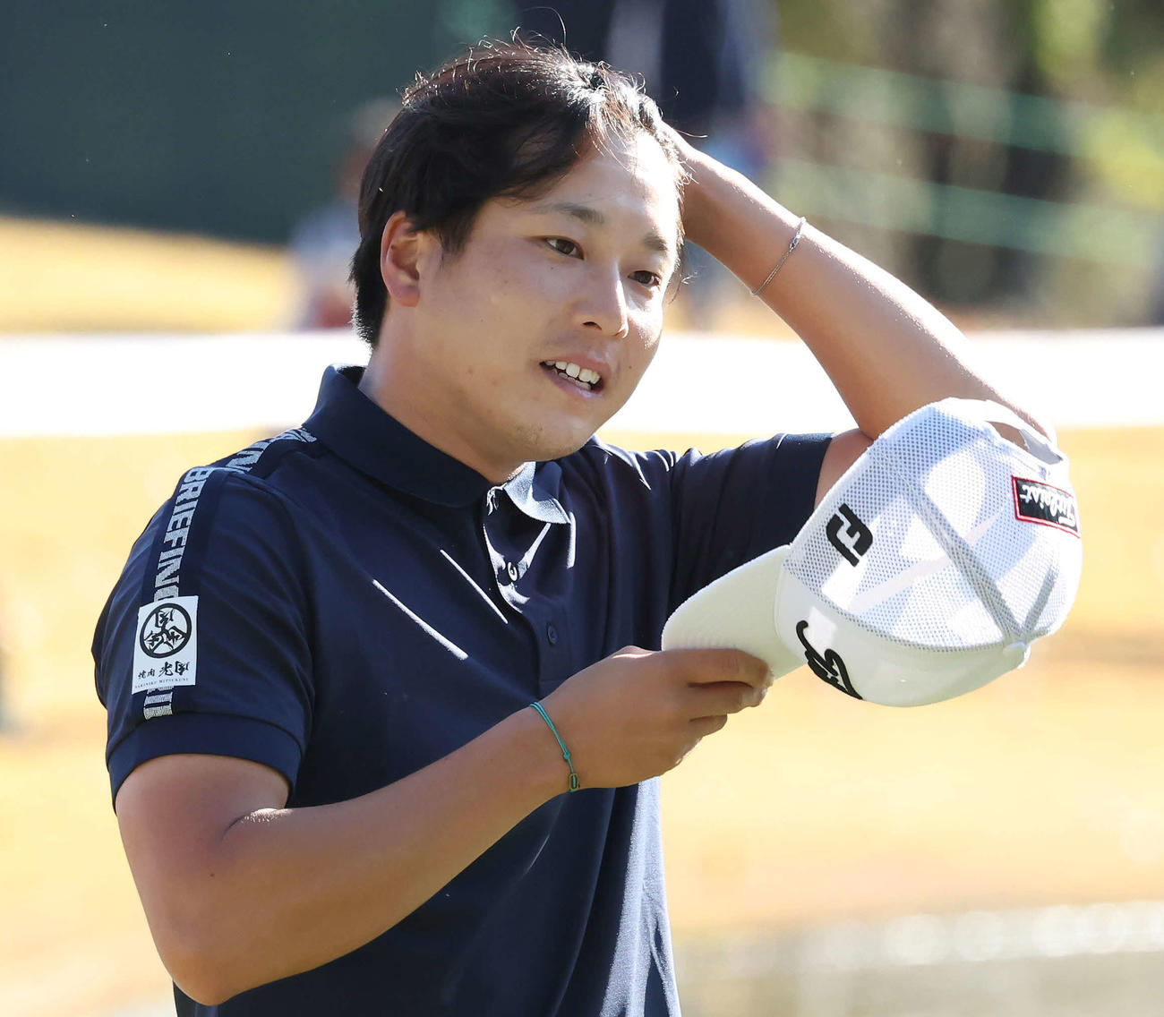 18番、首位と2打差6アンダーでホールアウトした勝俣（撮影・丹羽敏通）