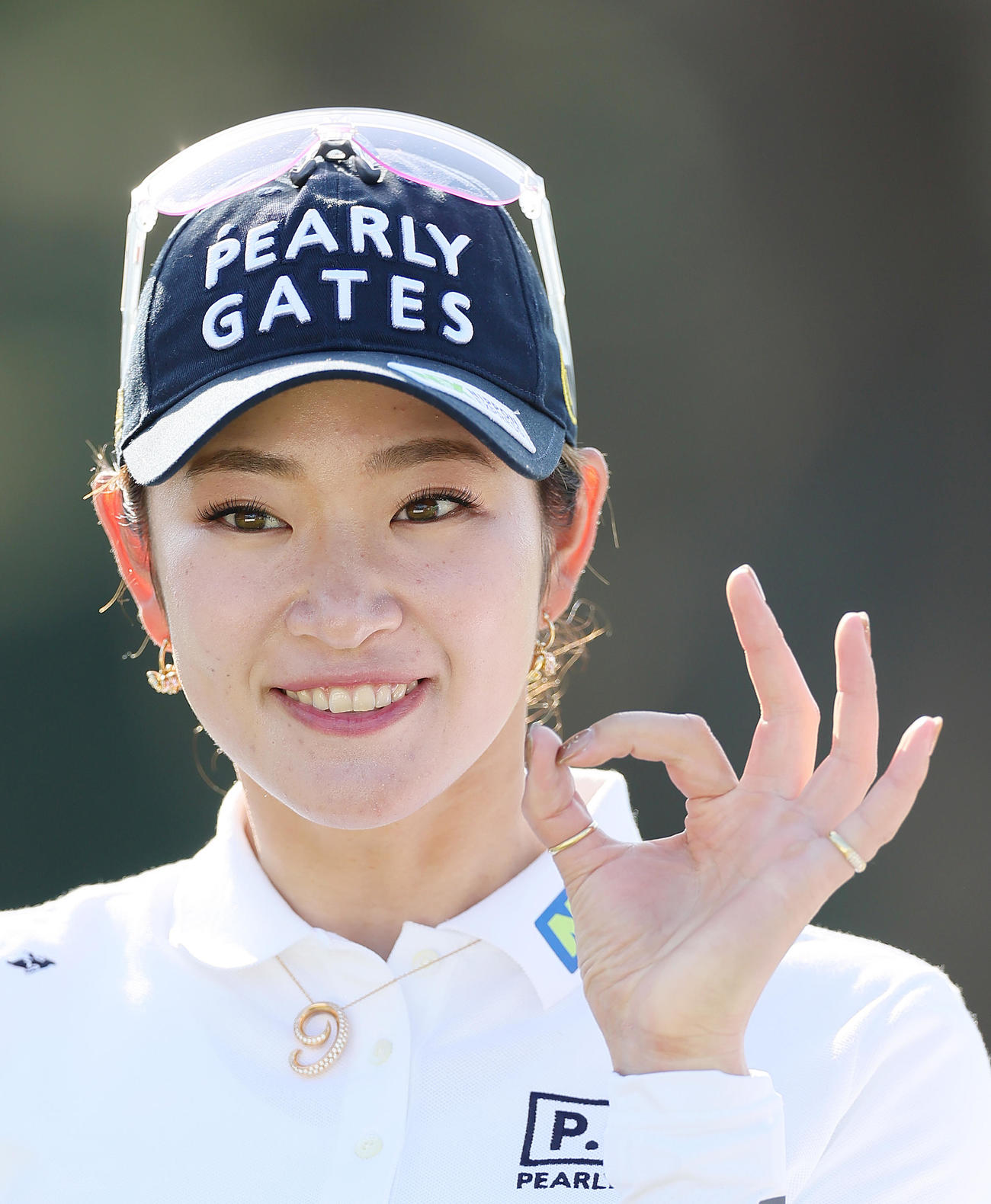 5月3日、プロアマ戦のスタートを前に笑顔を見せる原