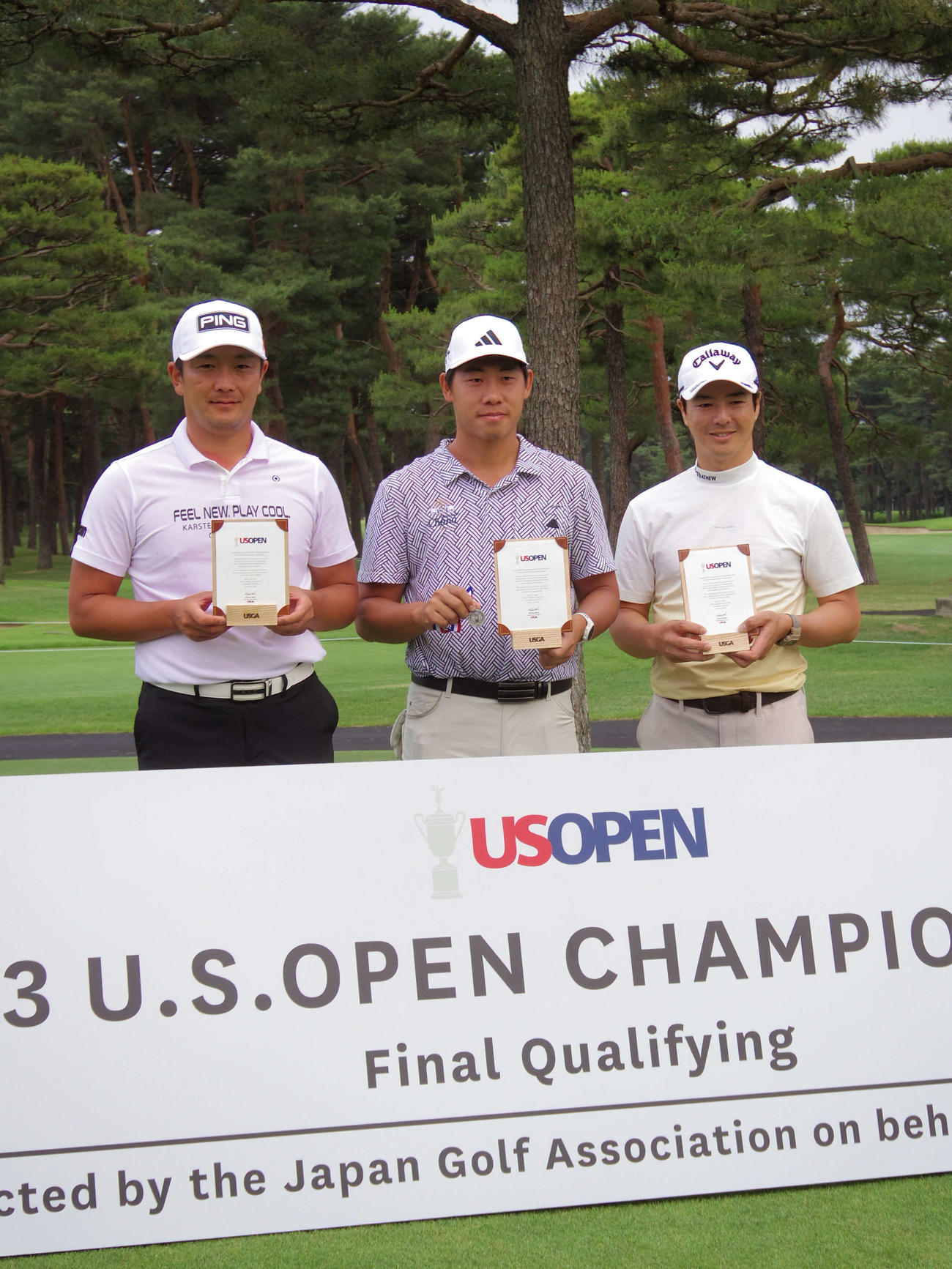 写真左から2位永野、優勝したチャルングン、3位石川