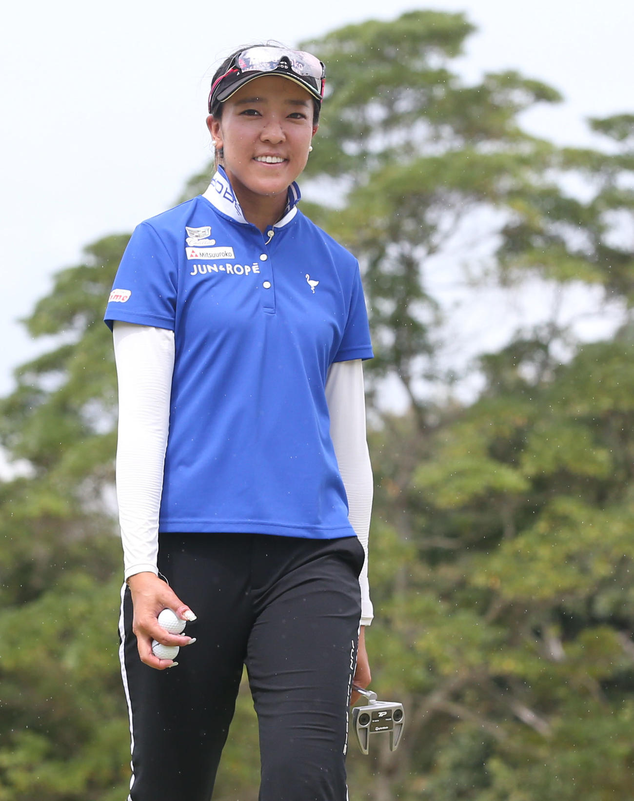 18番、笑顔でホールアウトするエイミー・コガ（撮影・冨田成美）