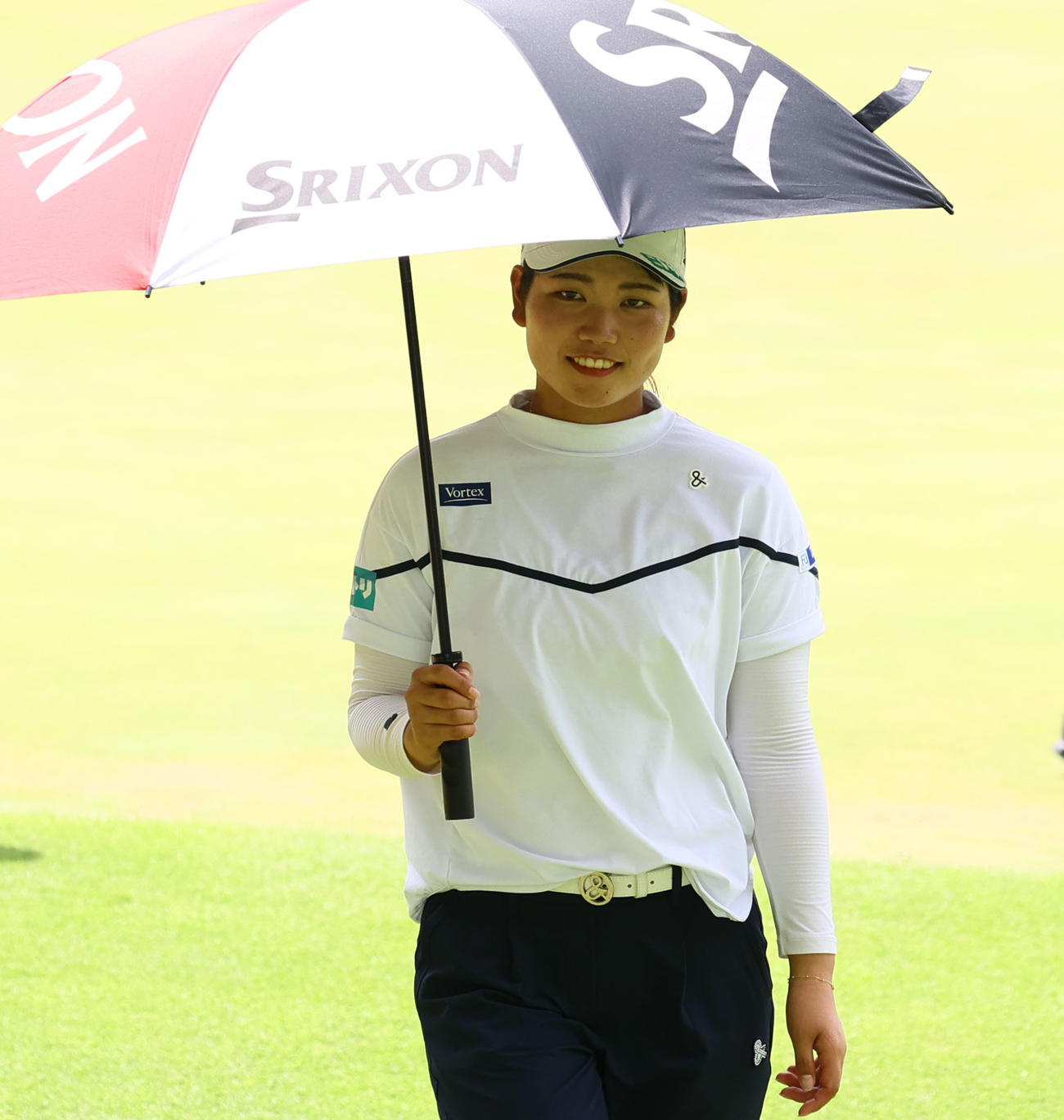 9番、練習ラウンドを終えて笑顔でホールアウトする桜井（撮影・冨田成美）