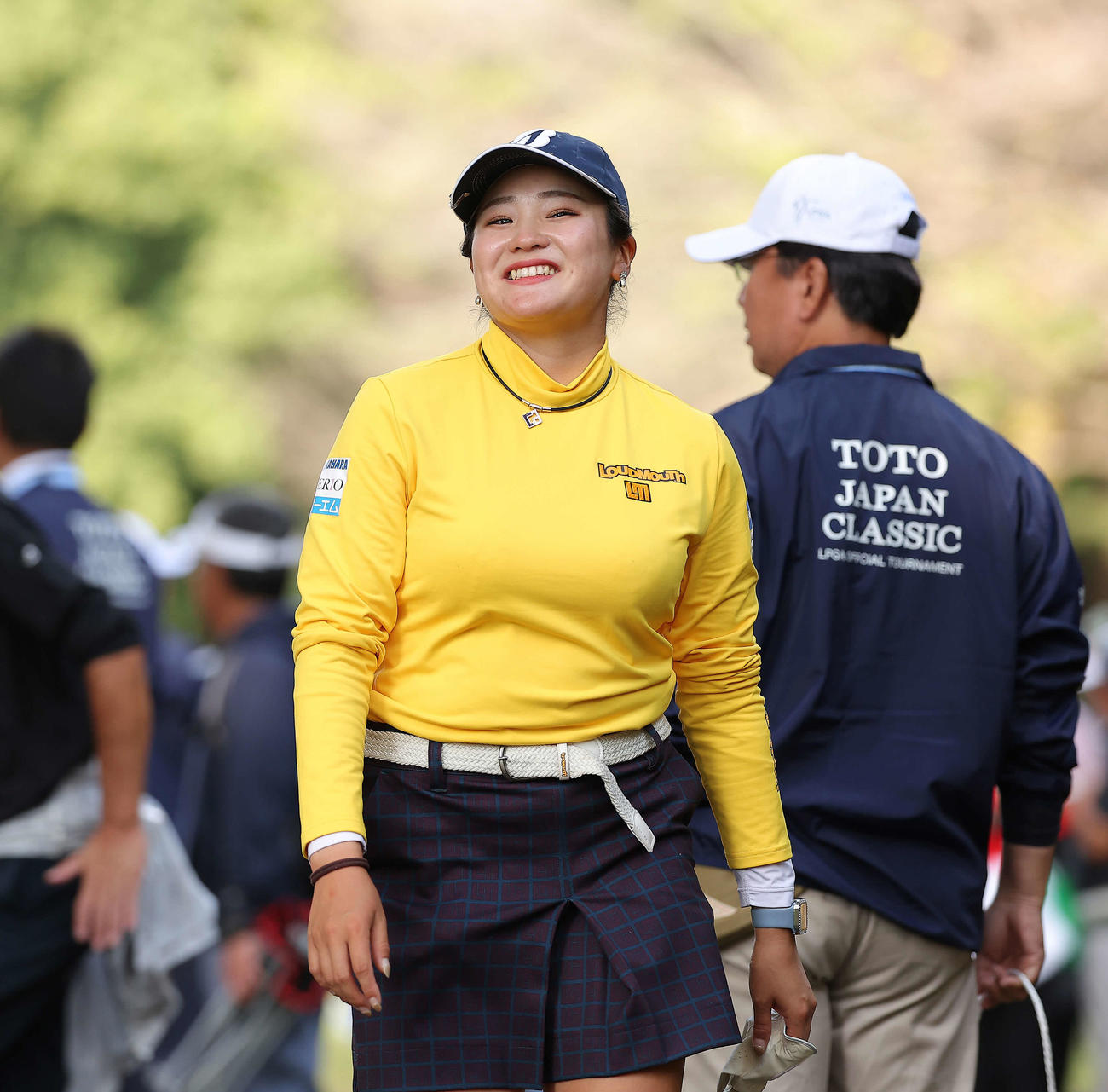 8番ティーグラウンドに笑顔で移動する桑木（撮影・河田真司）