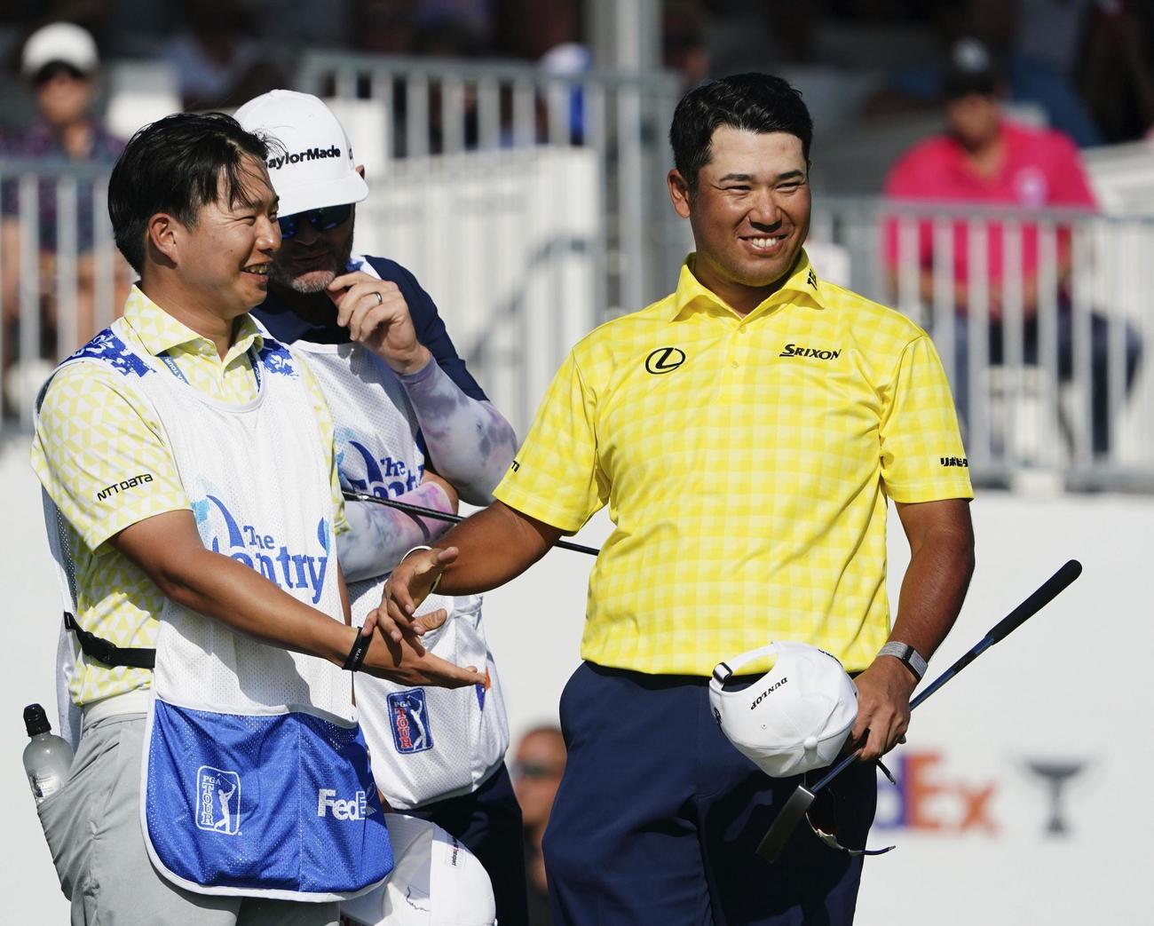 最終ラウンド、優勝が決まり笑顔を見せる松山英樹（共同）