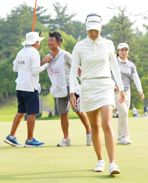 永峰（後方右）とのプレーオフで敗れた木戸（撮影・江口和貴）