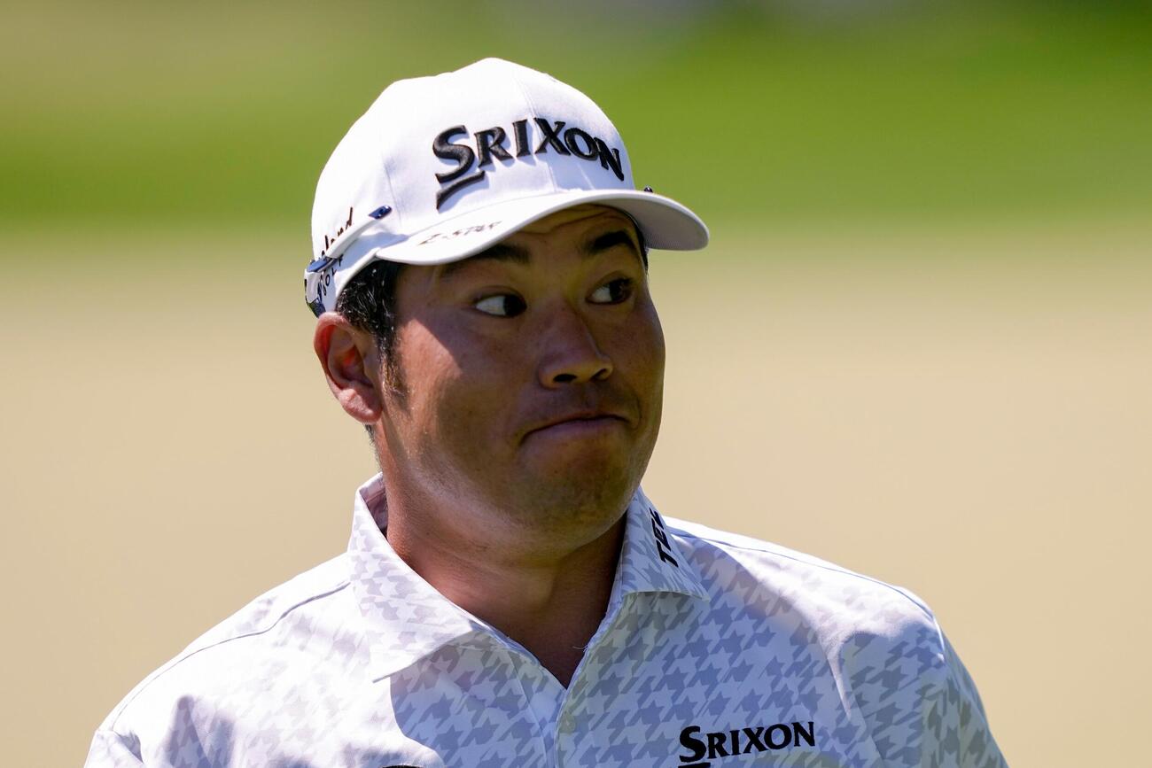 松山英樹は全米プロ選手権第3日、1番グリーン上でパット後に表情を崩した（AP)