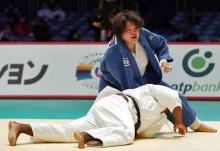 オルティス（下）を片手絞め一本で下す田知本（撮影・狩俣裕三）