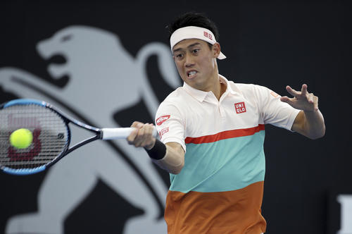 リターンする錦織（AP）