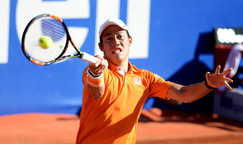 ナダルとの決勝でリターンする錦織(撮影・PIKO)
