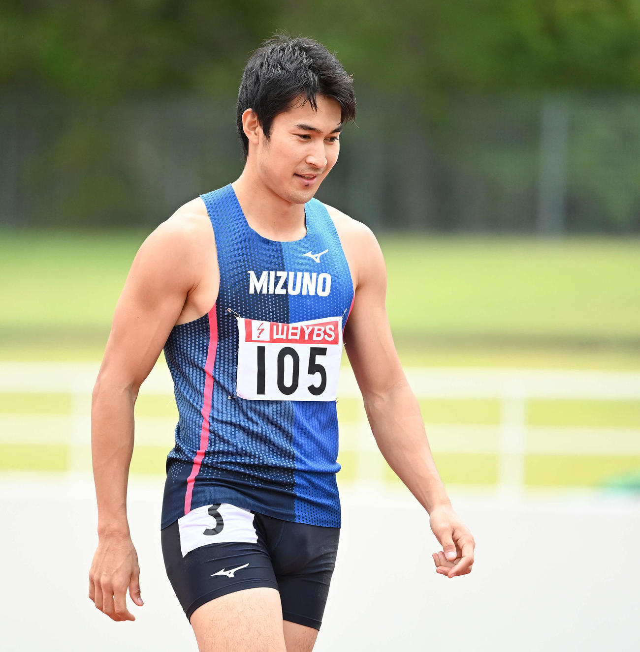 タイムレースで争われる男子100メートルの2本目で全体トップとなった飯塚（撮影・鈴木みどり）
