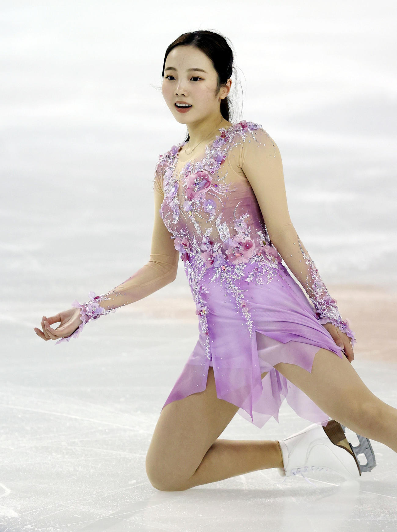 女子フリーの演技後、コーチに視線を向け、苦笑いする本田真（撮影・狩俣裕三）