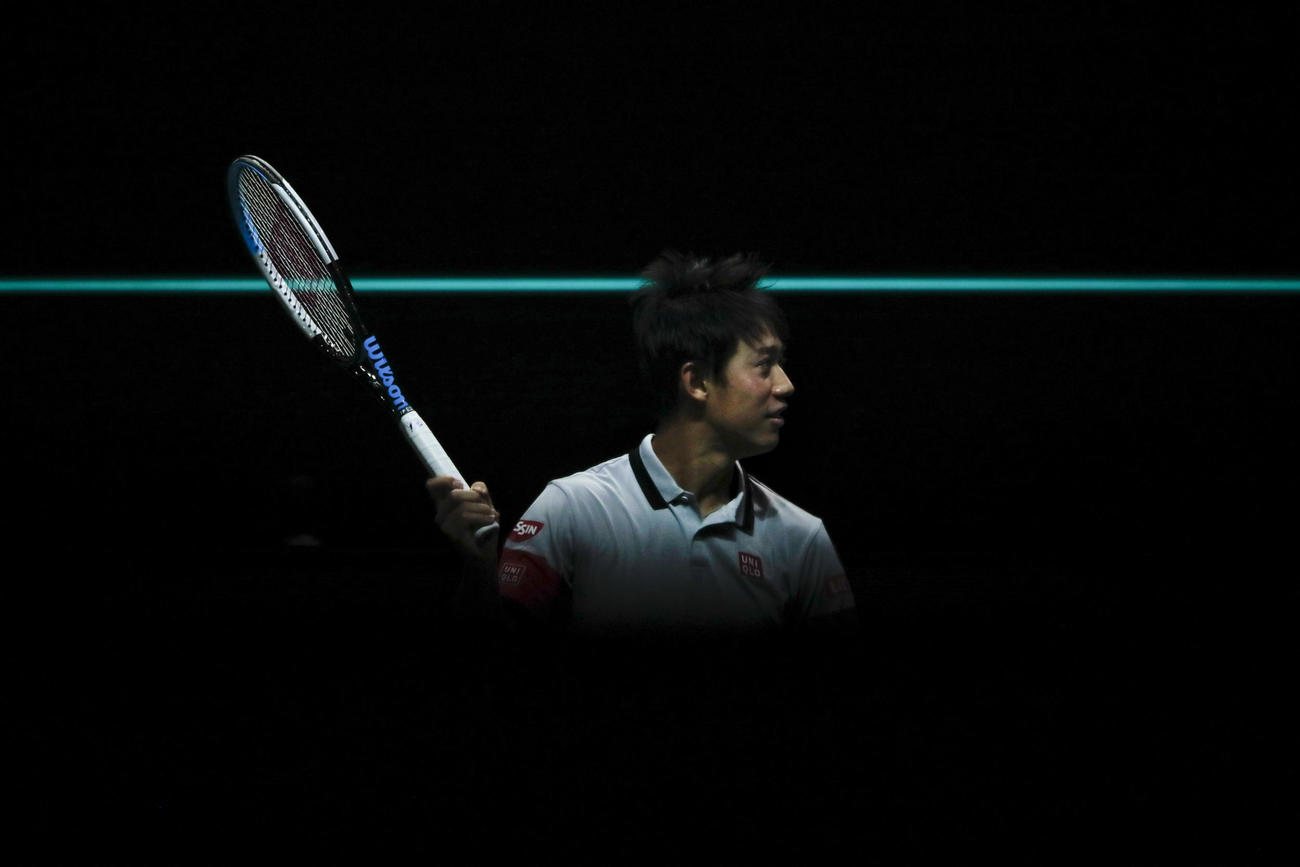 ABN・AMROワールド1回戦、試合に勝利し笑顔を見せる錦織（AP）