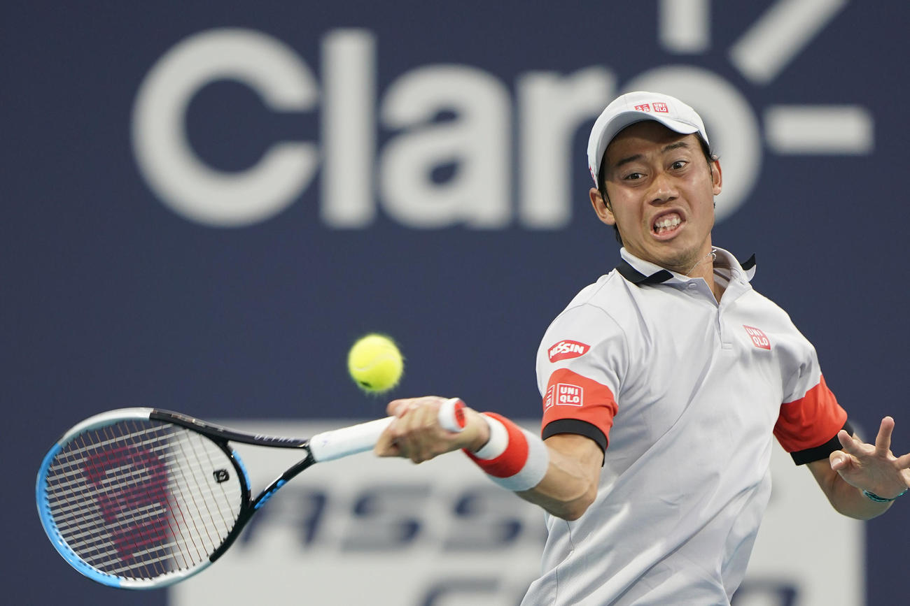 マイアミオープン3回戦　チチパスと対戦する錦織（AP）