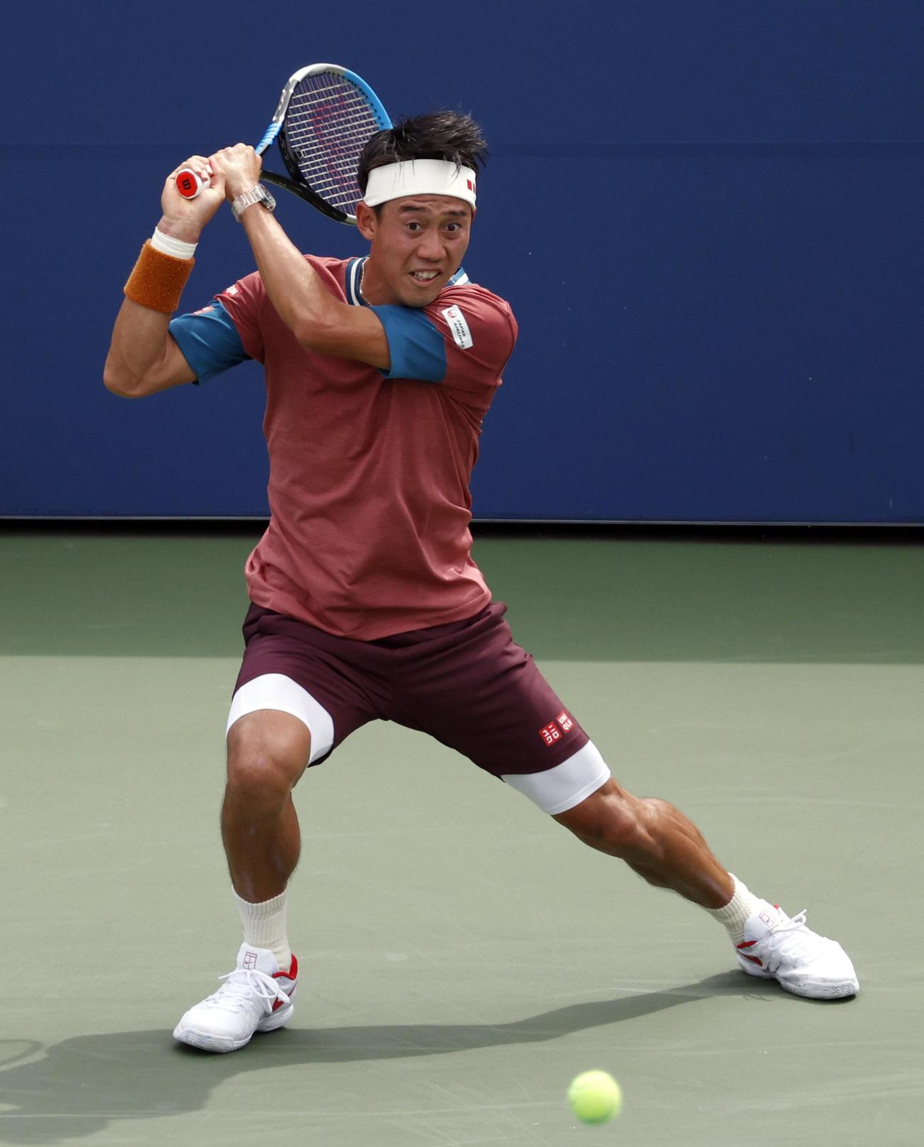 男子シングルス1回戦でプレーする錦織圭（USAトゥデー・ロイター＝共同）