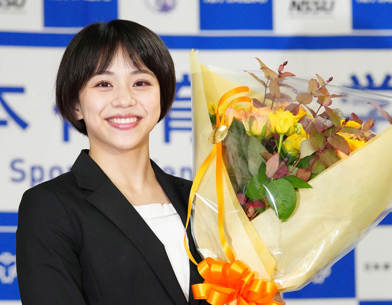 引退会見を終え笑顔を見せる村上（撮影・江口和貴）