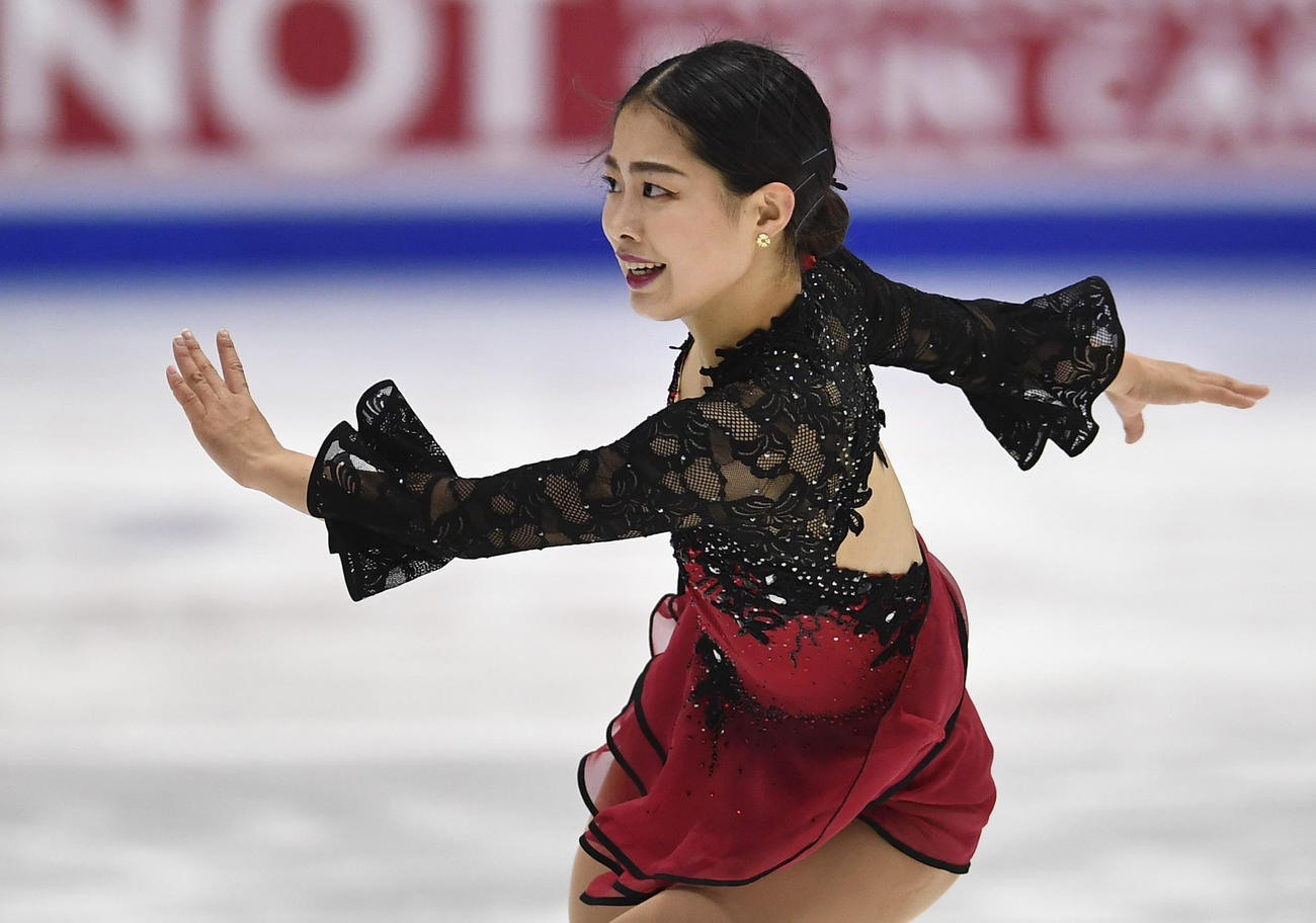 4大陸選手権女子SP　演技する横井ゆは菜（AP）
