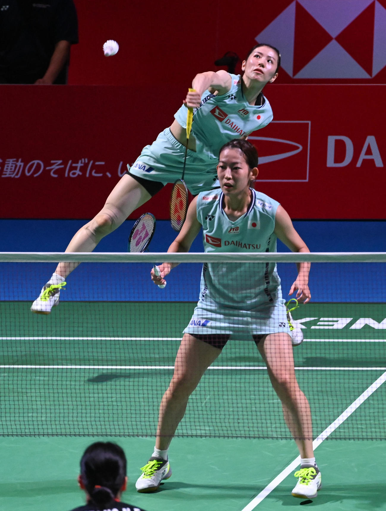 女子ダブルス。キム・ヘジョン、ジュン・ナユンのペアに敗れた志田（奥）松山ペア（撮影・前岡正明）
