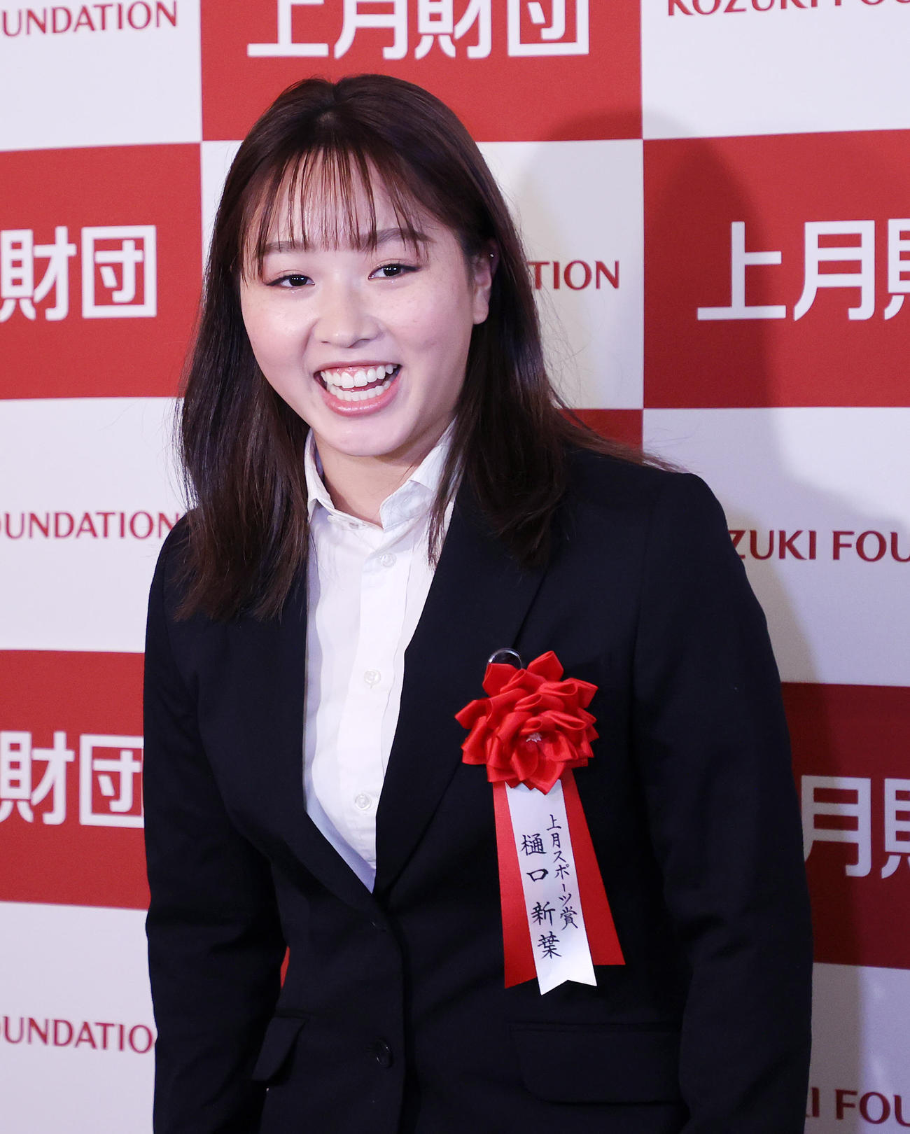 報道陣の質問に答える樋口（撮影・鈴木正人）