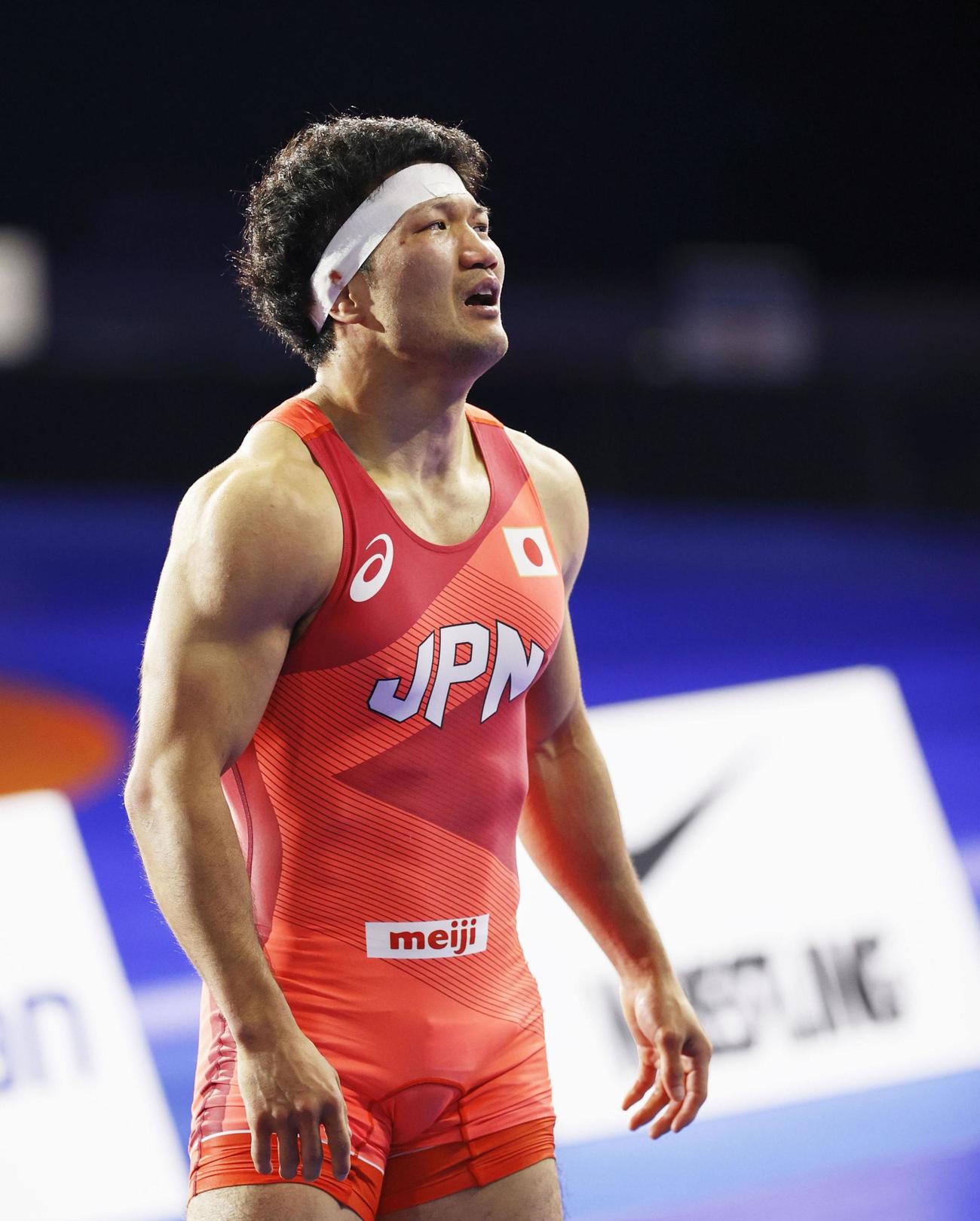 男子フリー70キロ級で優勝し、感極まった表情の成国大志（共同）