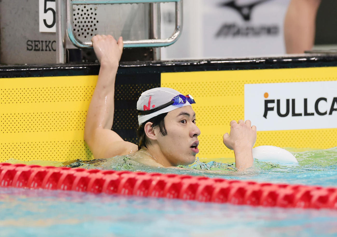 男子200メートルバタフライ予選を終えた本多（撮影・足立雅史）