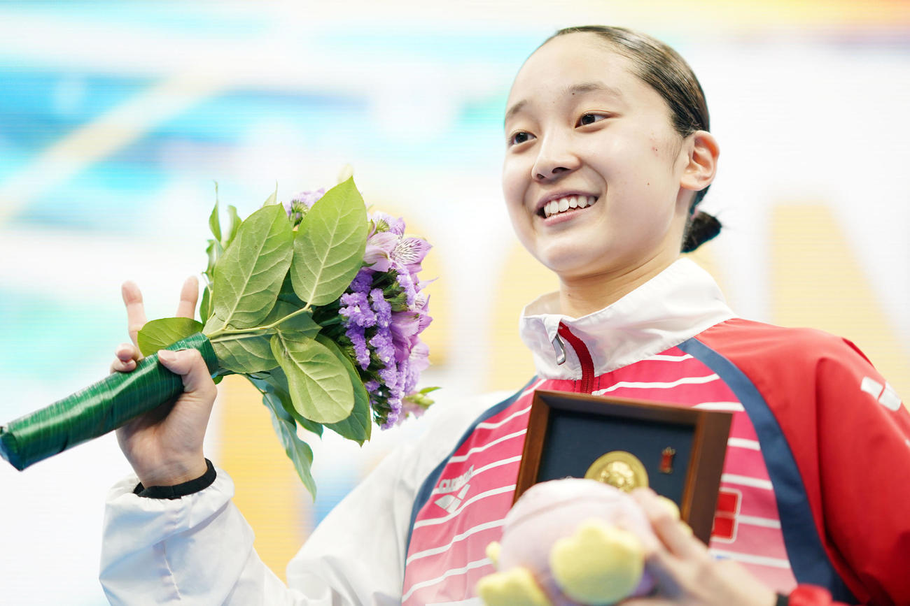 日本選手権2冠を達成し笑顔を見せる成田（撮影・横山健太）
