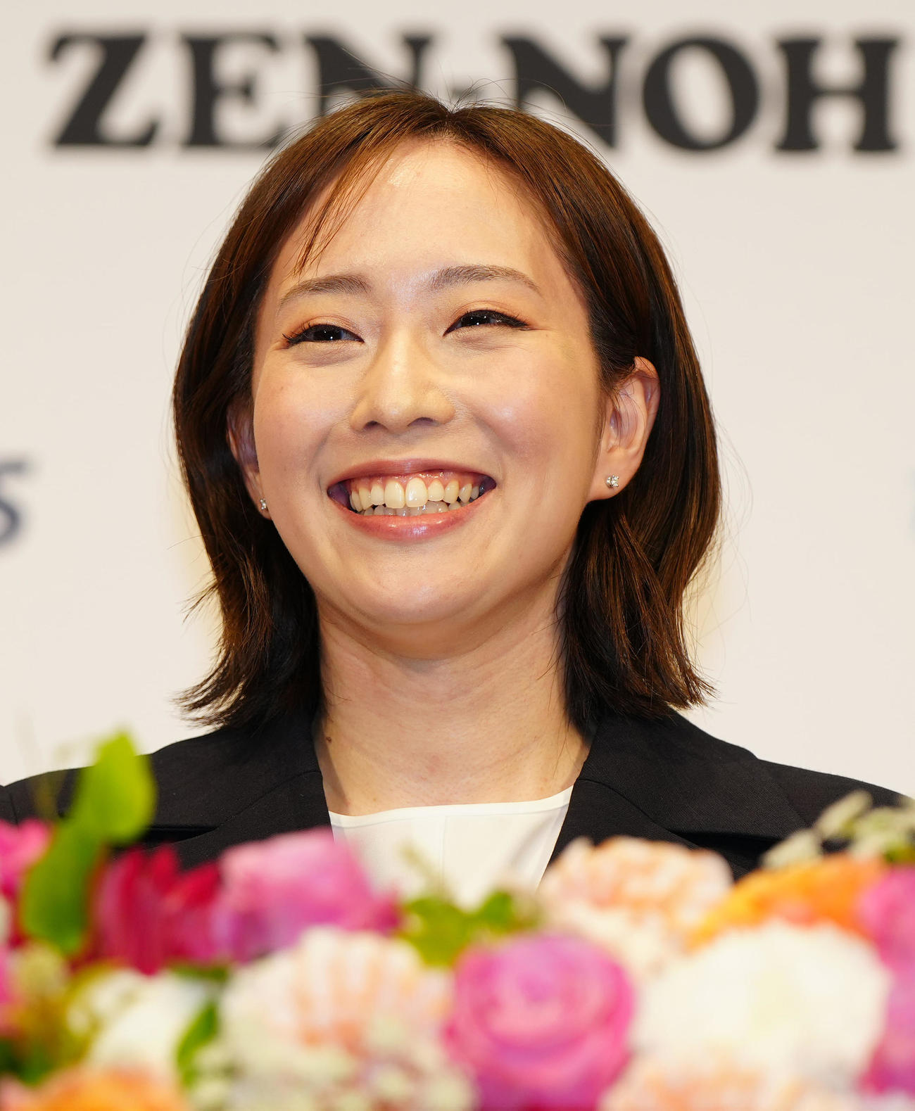 引退会見で笑顔を見せる石川さん（撮影・江口和貴）