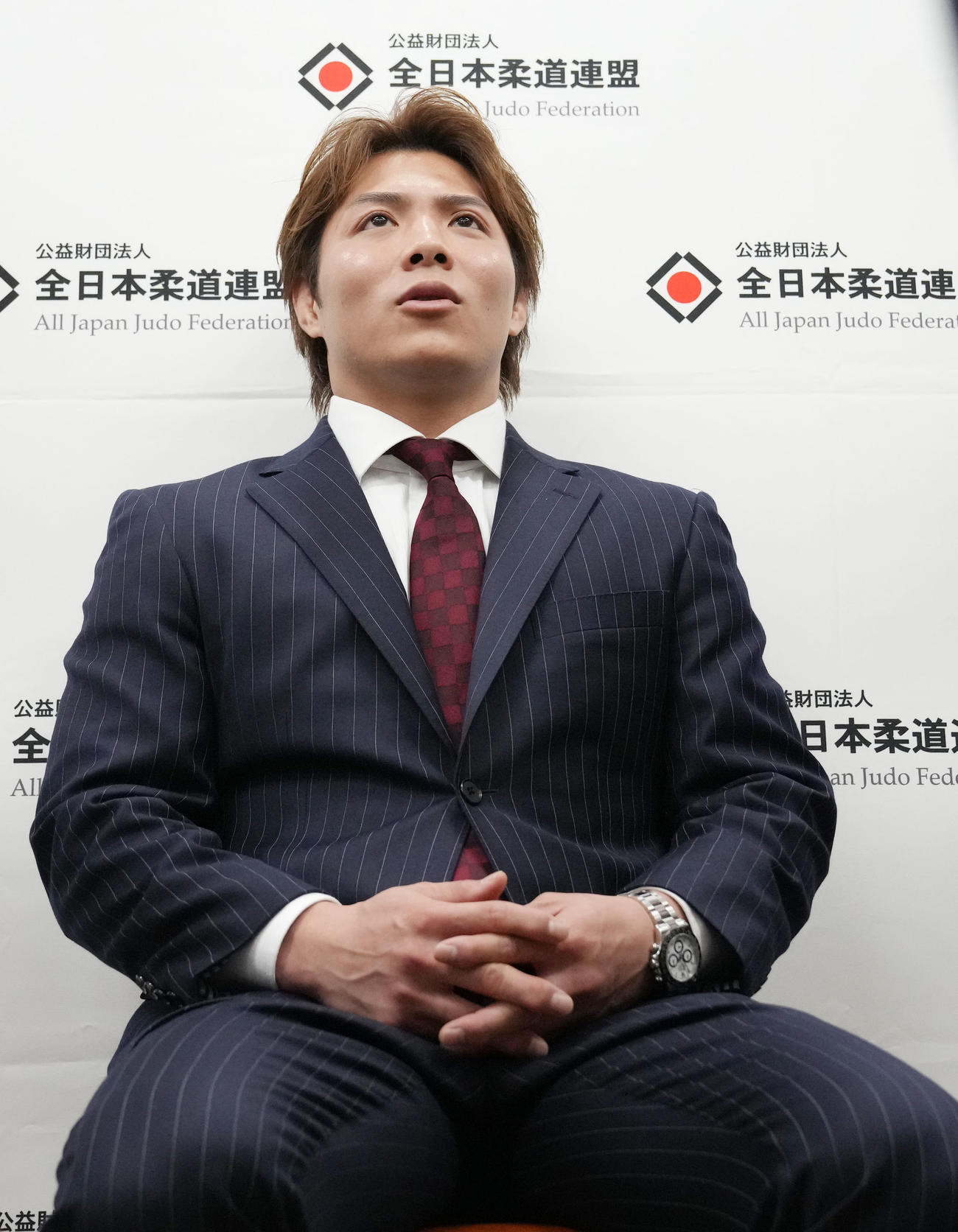 パリ五輪代表に内定し、記者の質問に答える男子66級の阿部一（撮影・狩俣裕三）