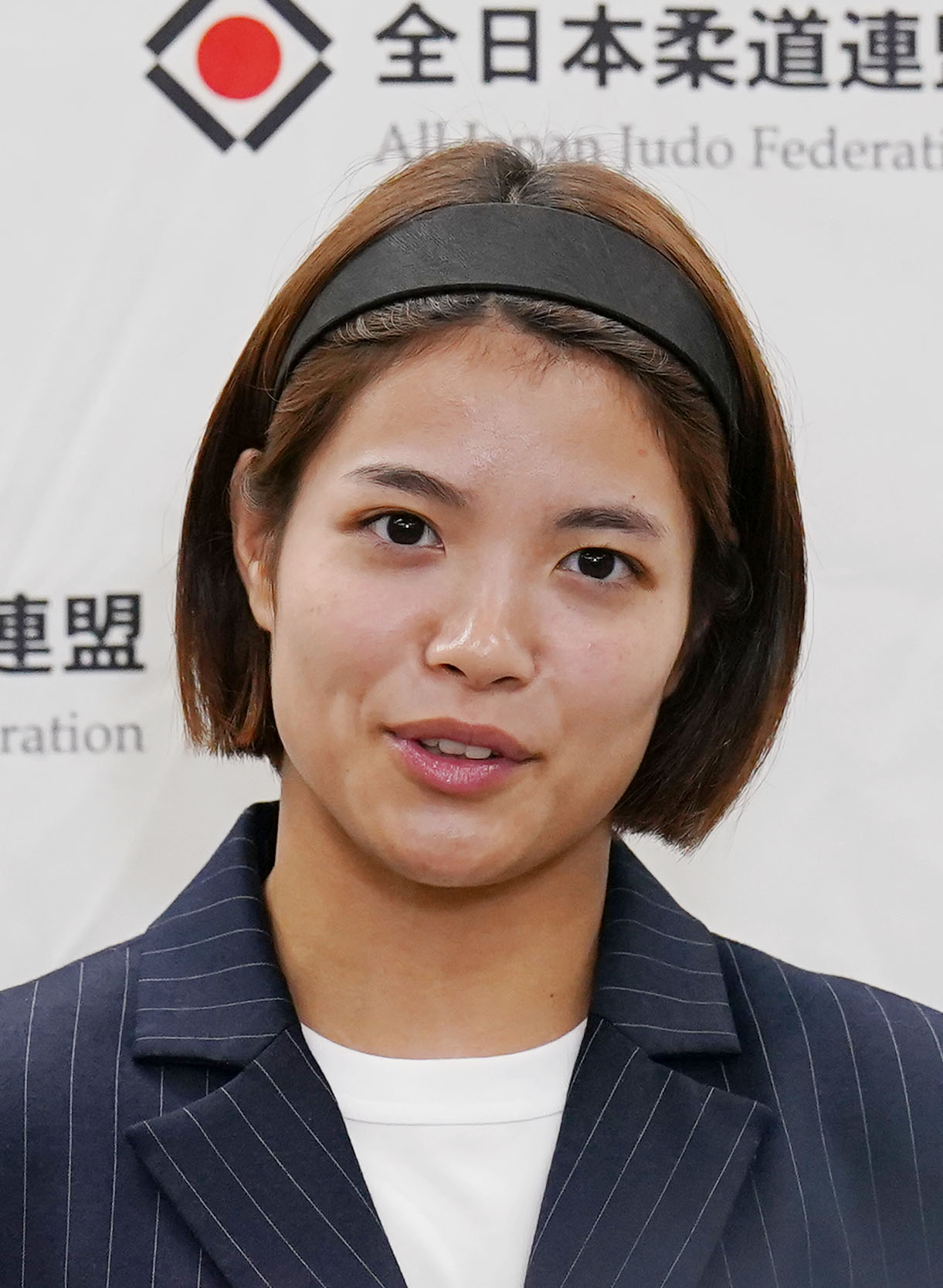 パリ五輪代表に内定し、記者の質問に答える女子52キロ級の阿部詩（撮影・狩俣裕三）