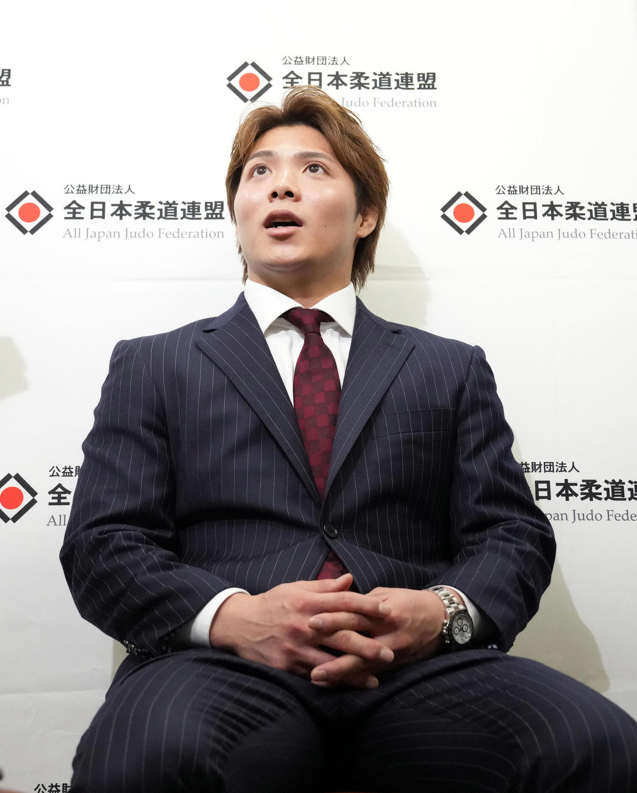 パリ五輪代表に内定し、記者の質問に答える男子66級の阿部一（撮影・狩俣裕三）
