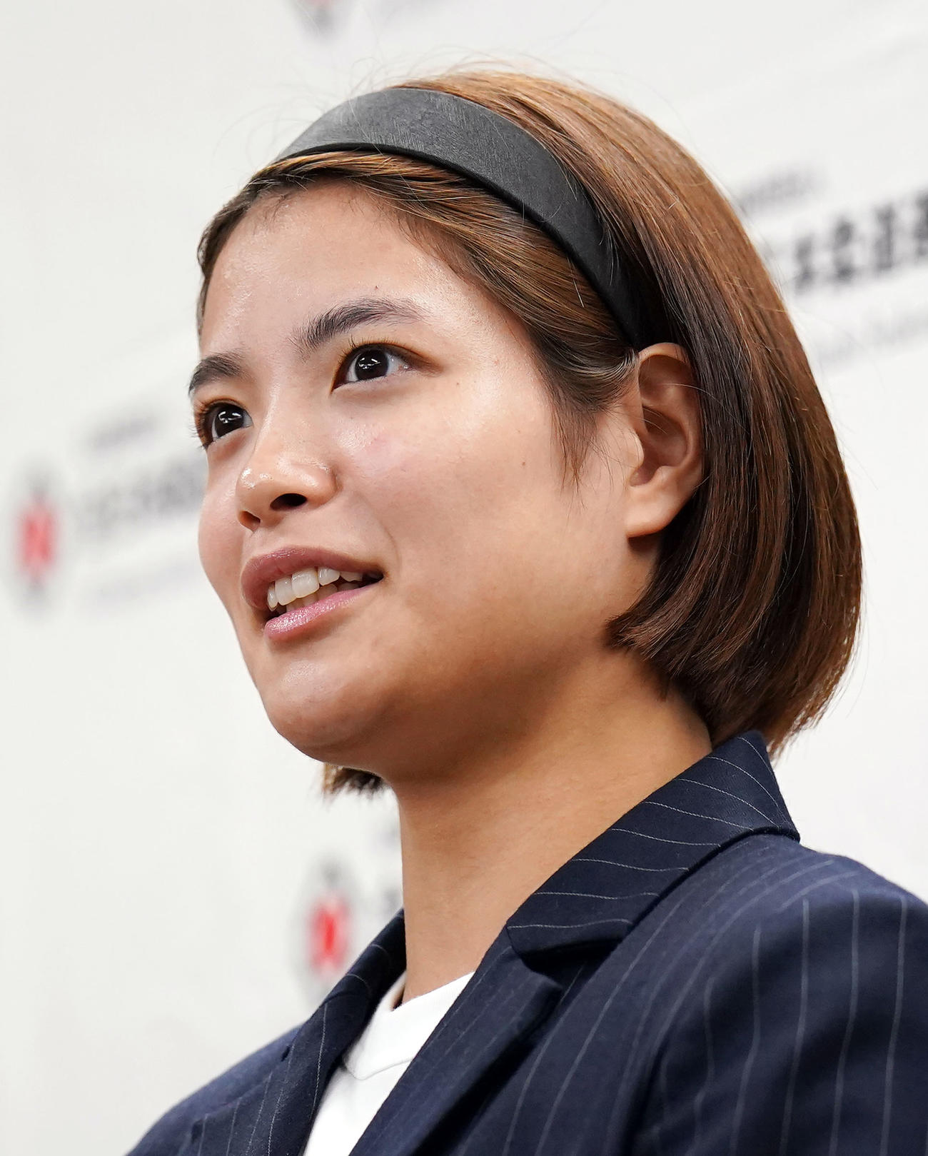 パリ五輪代表に内定し、記者の質問に答える女子52キロ級の阿部詩（撮影・狩俣裕三）