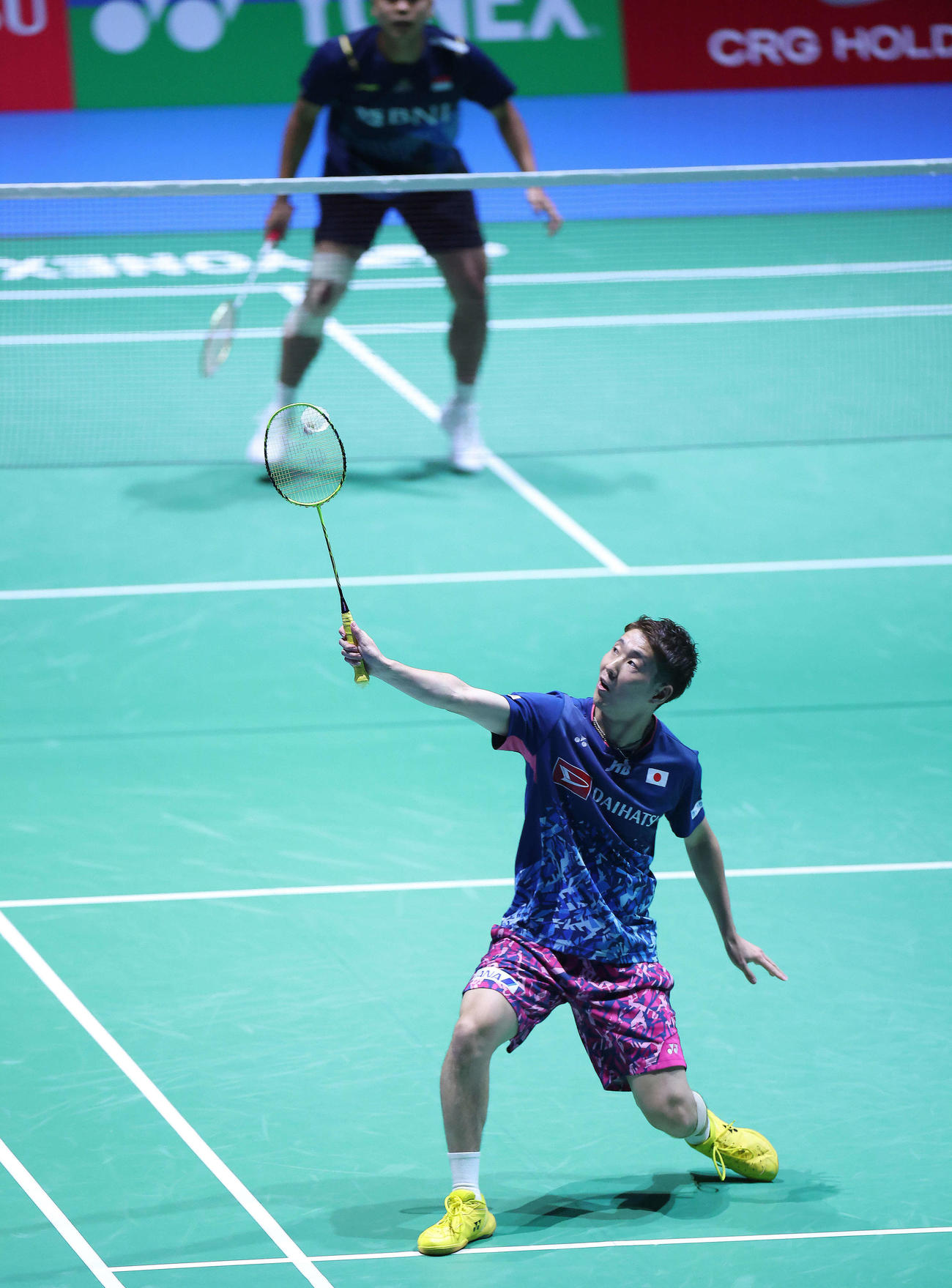 男子シングルス1回戦　シャトルを返す常山（撮影・河田真司）