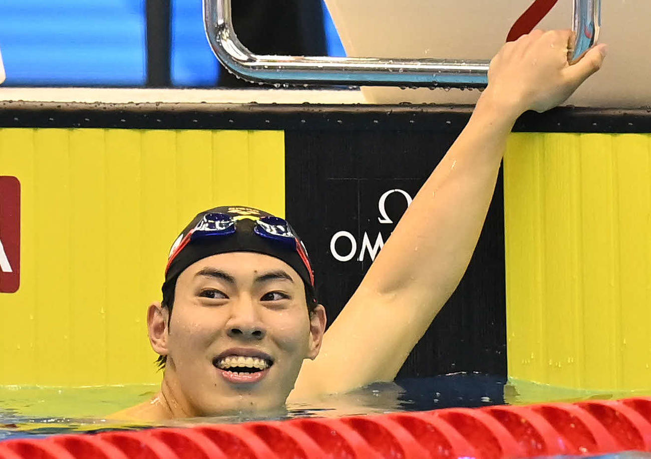 男子200メートルバタフライ決勝　3位となった本多は笑顔を見せる（撮影・岩下翔太）