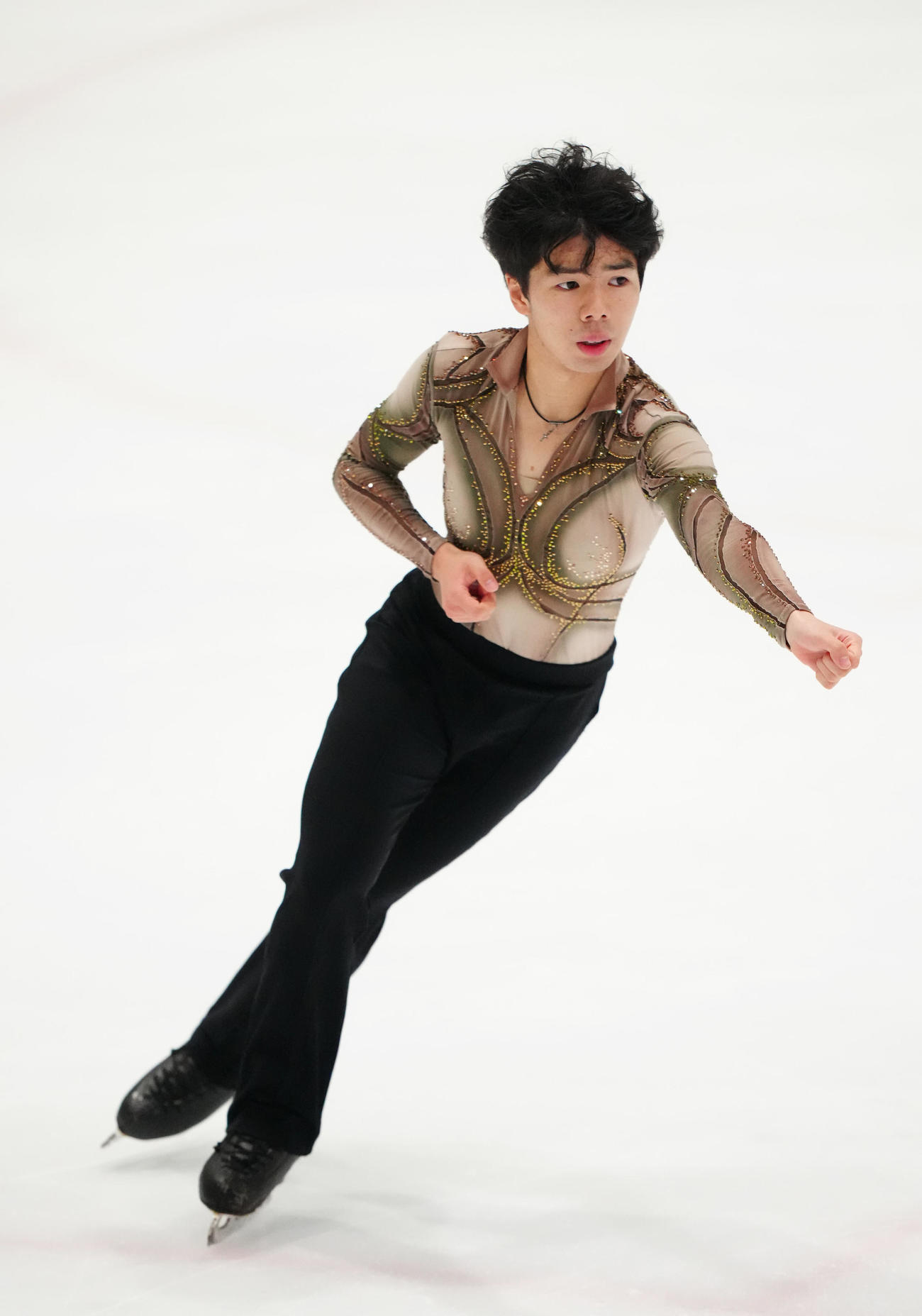 男子フリーで演技する佐藤駿（撮影・江口和貴）