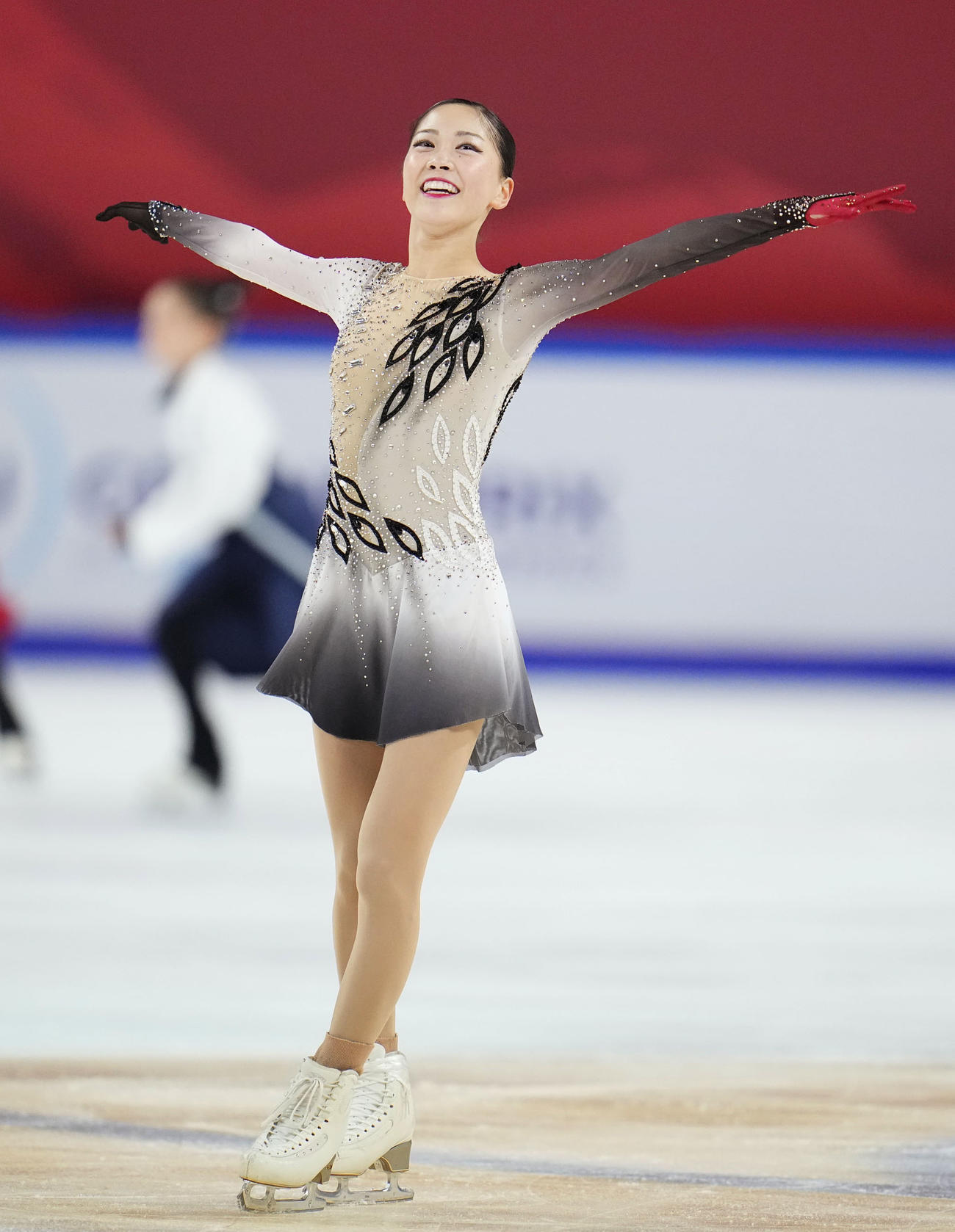 女子フリーの演技を終え、笑顔の吉田陽菜。初優勝を果たした（共同）