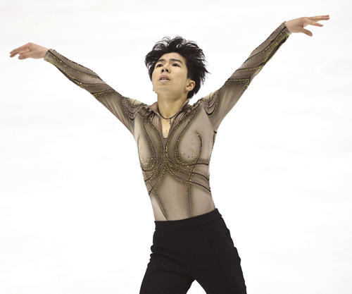 男子フリーの演技をする佐藤駿（AP）