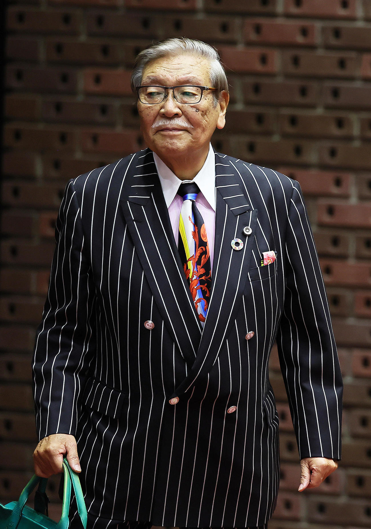 会見に登壇した第三者委員会の久保利英明議長（撮影・足立雅史）