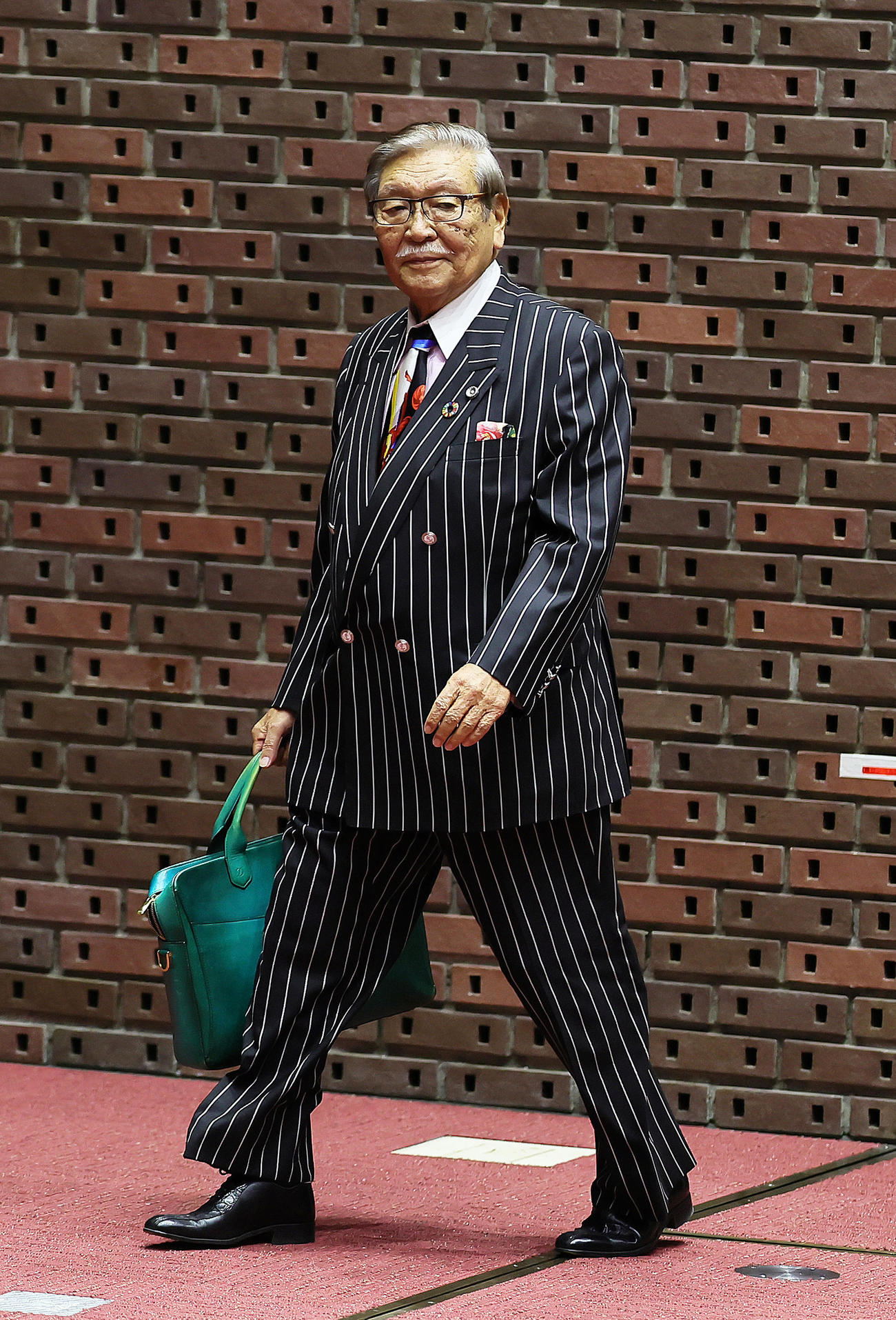 会見に登壇した第三者委員会の久保利英明議長（撮影・足立雅史）