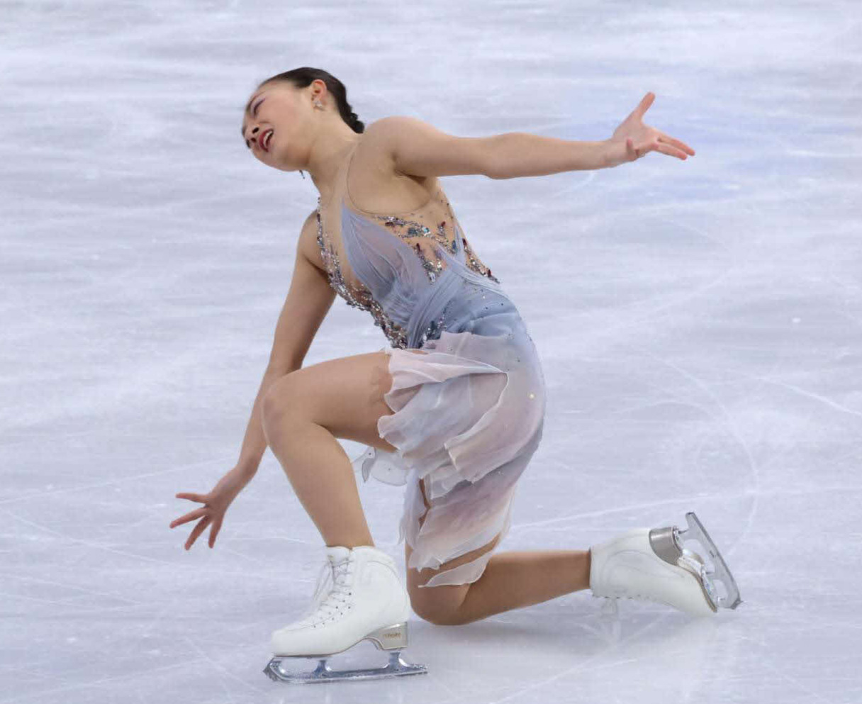 世界選手権女子SP　笑顔で演技する坂本花織（撮影・阿部健吾）