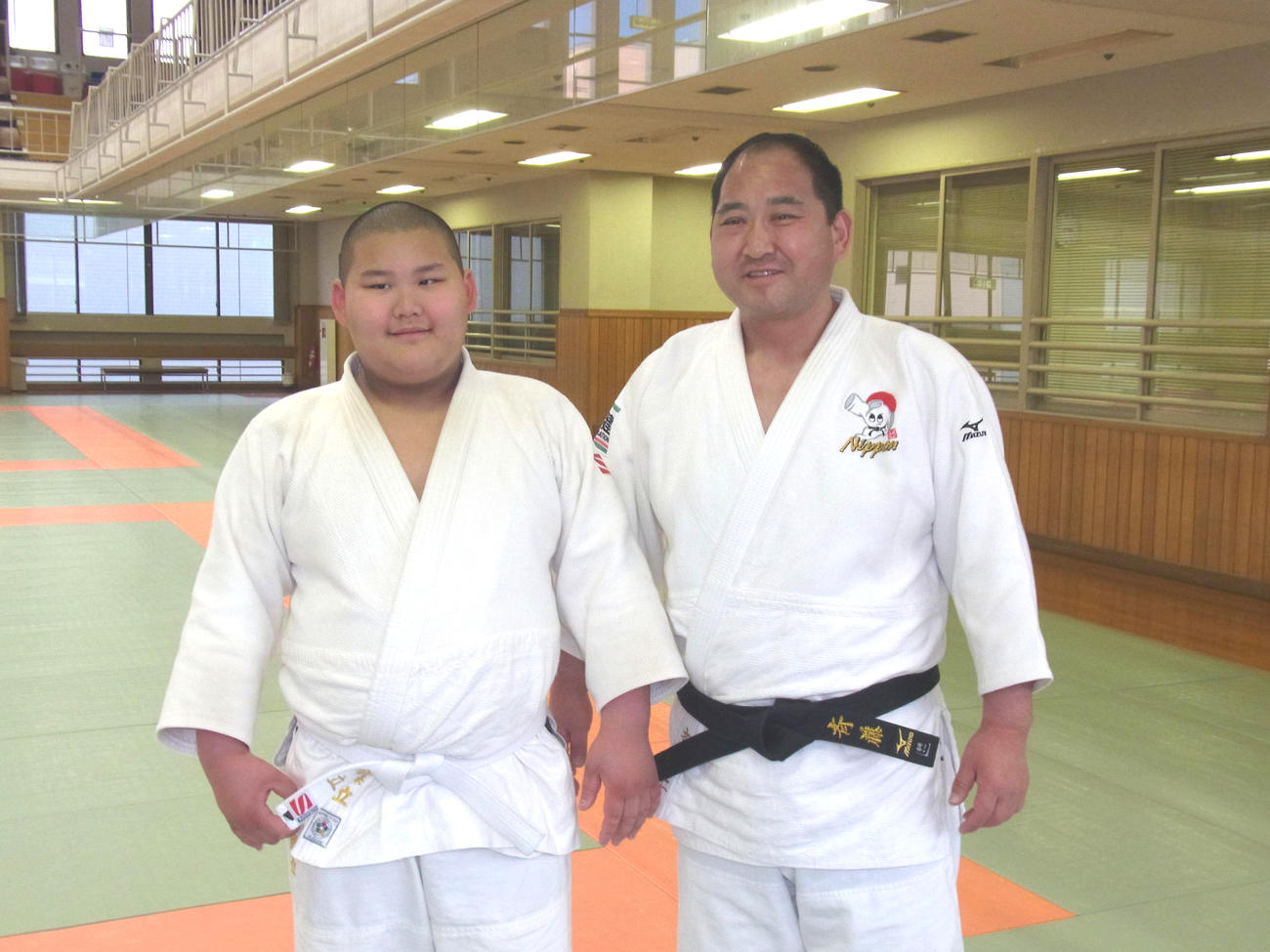 斉藤仁さん（右）と斉藤立（2013年撮影）