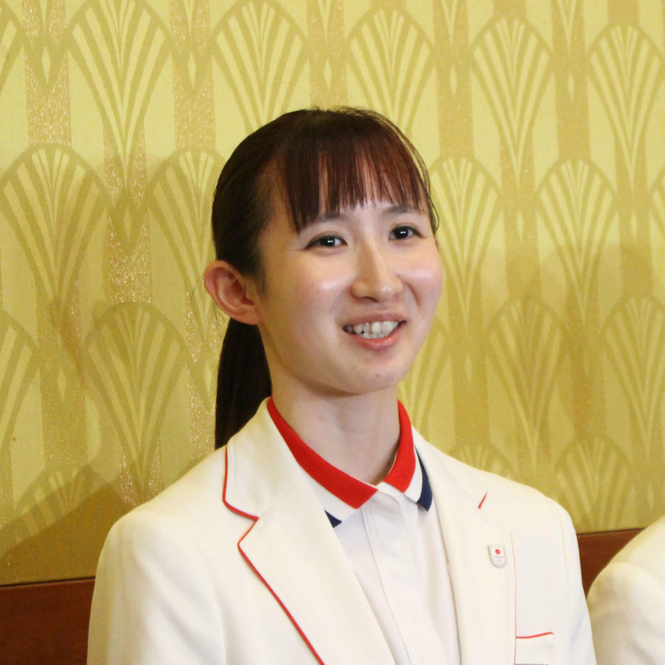 笑顔で取材に応じる早田（撮影・勝部晃多）
