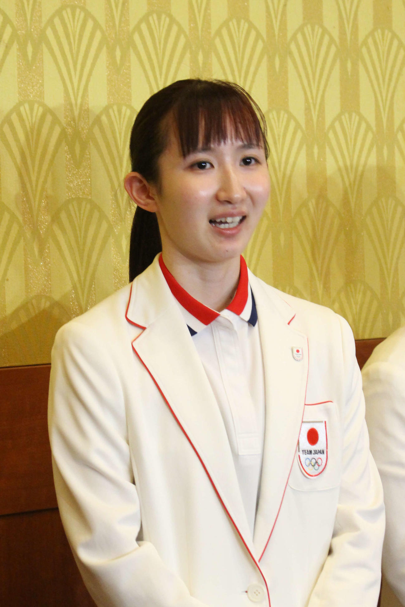 笑顔で取材に応じる早田（撮影・勝部晃多）