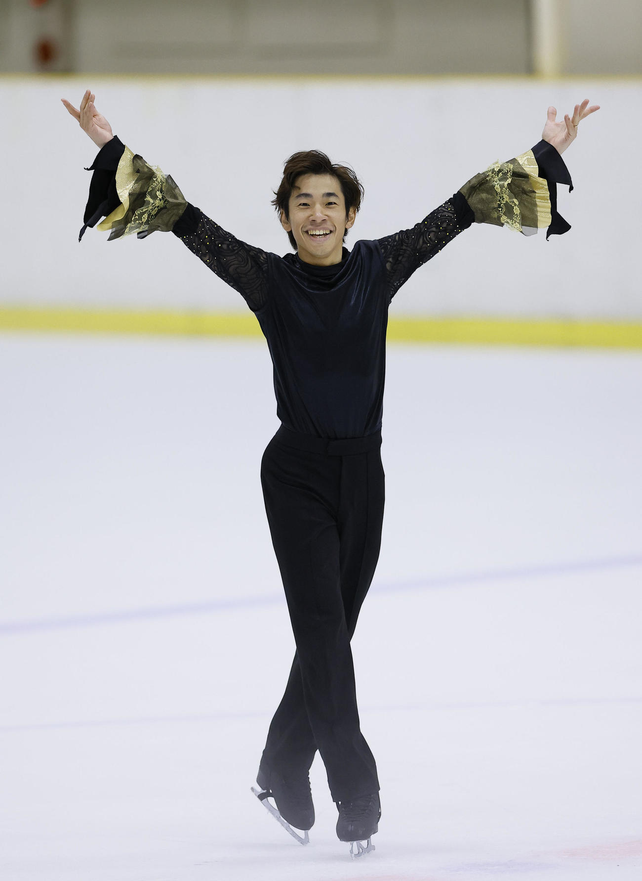男子ショートプログラム　演技を終え笑顔を見せる織田信成（撮影・藤尾明華）
