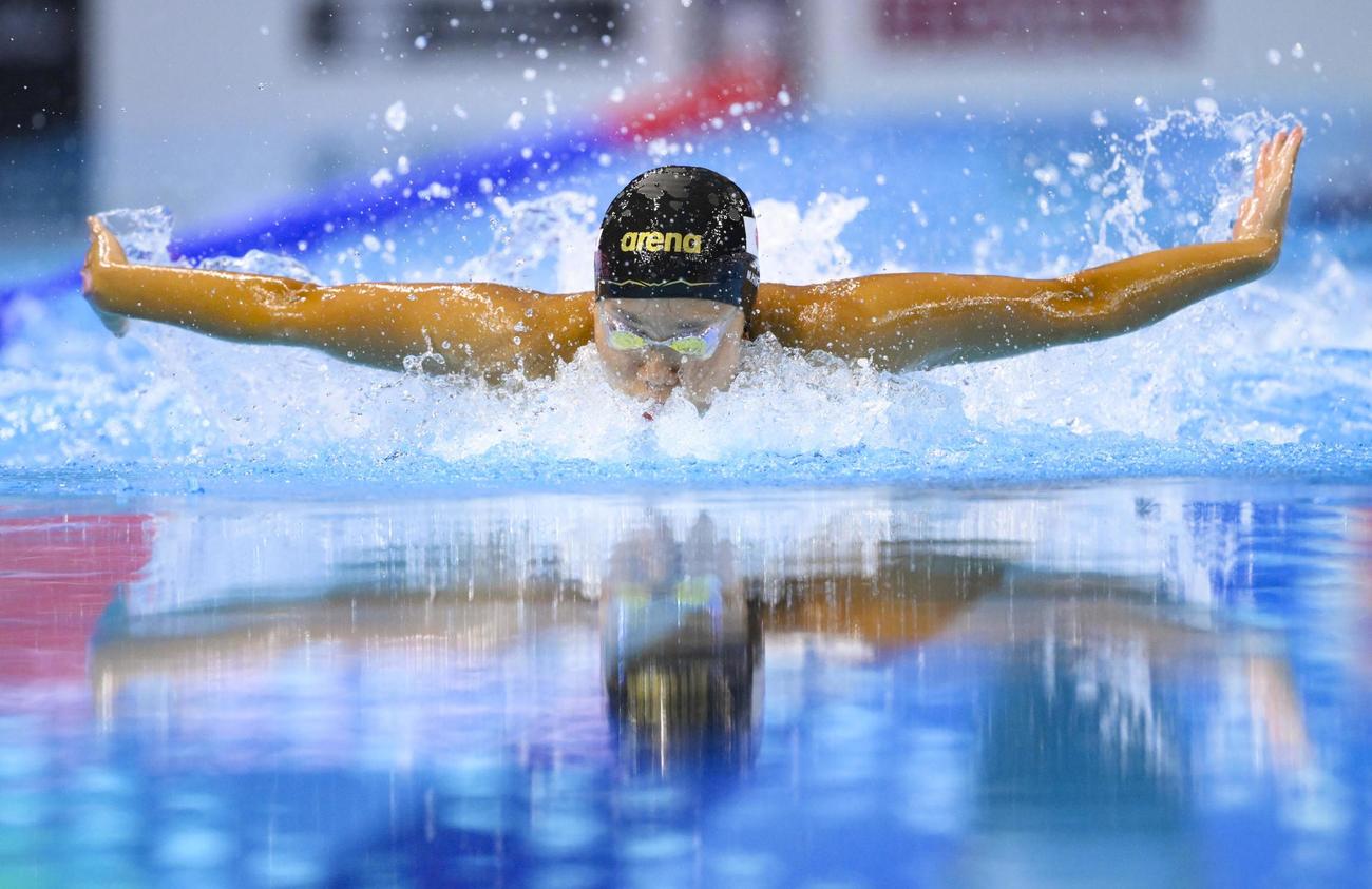 女子100メートルバタフライ決勝で7位の平井瑞希（共同）